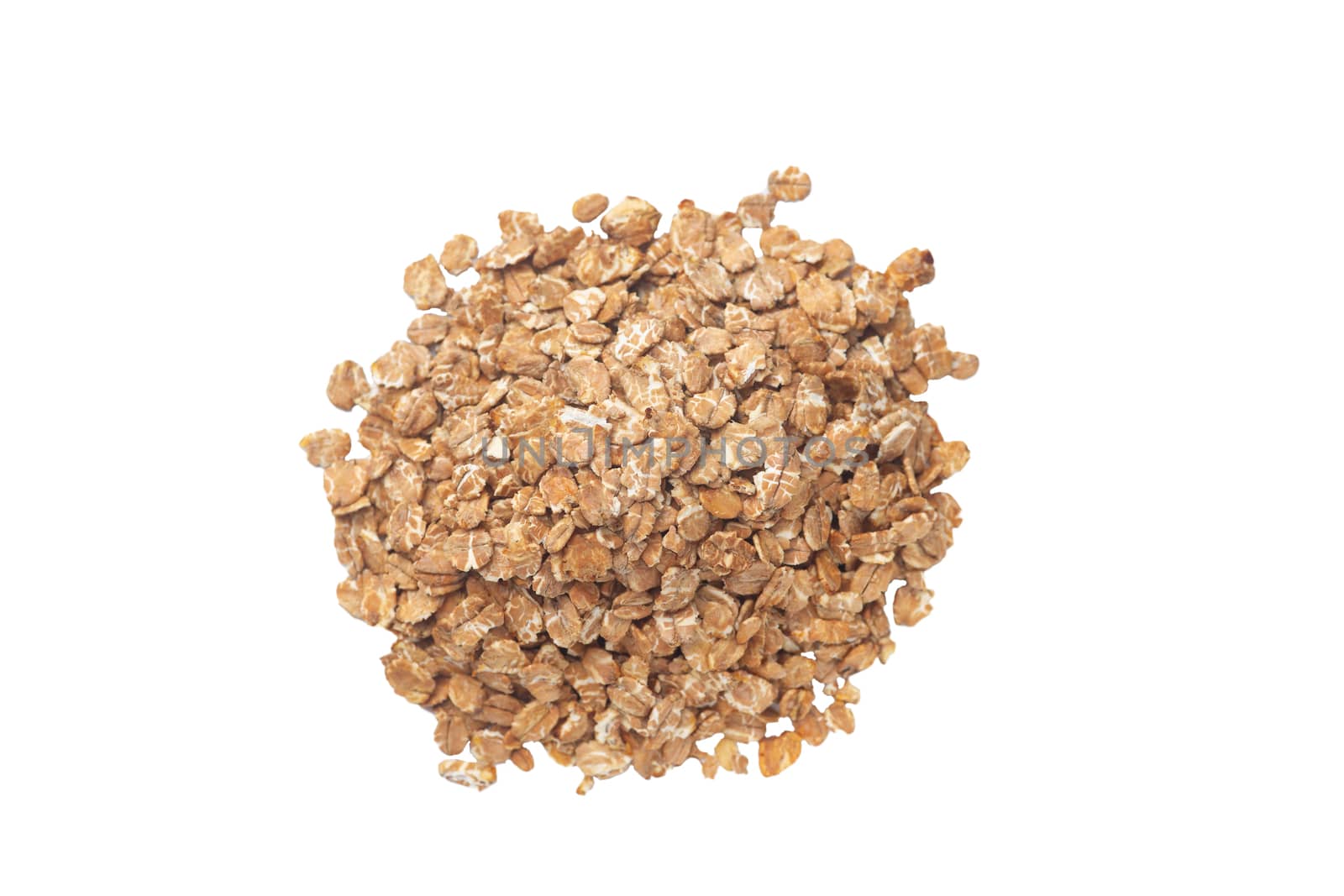 A bunch of cereal granola flakes isolated on white background.  by alexsdriver