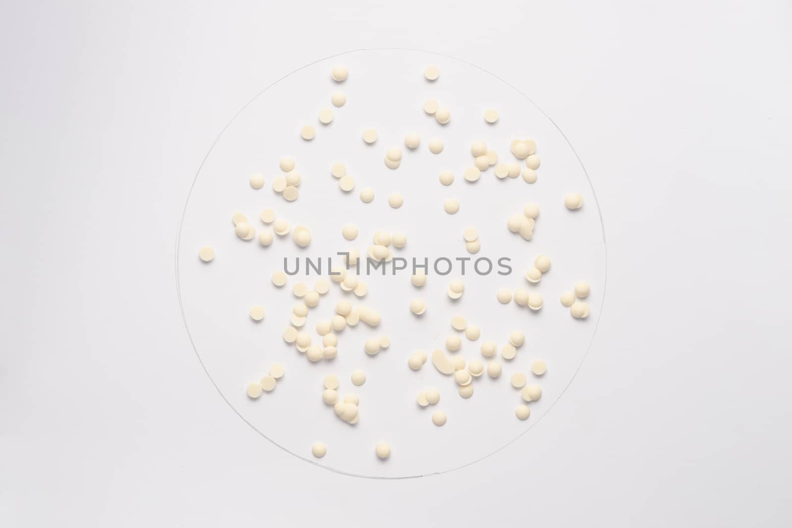 White chocolate pieces isolated on white backgroud.  by alexsdriver