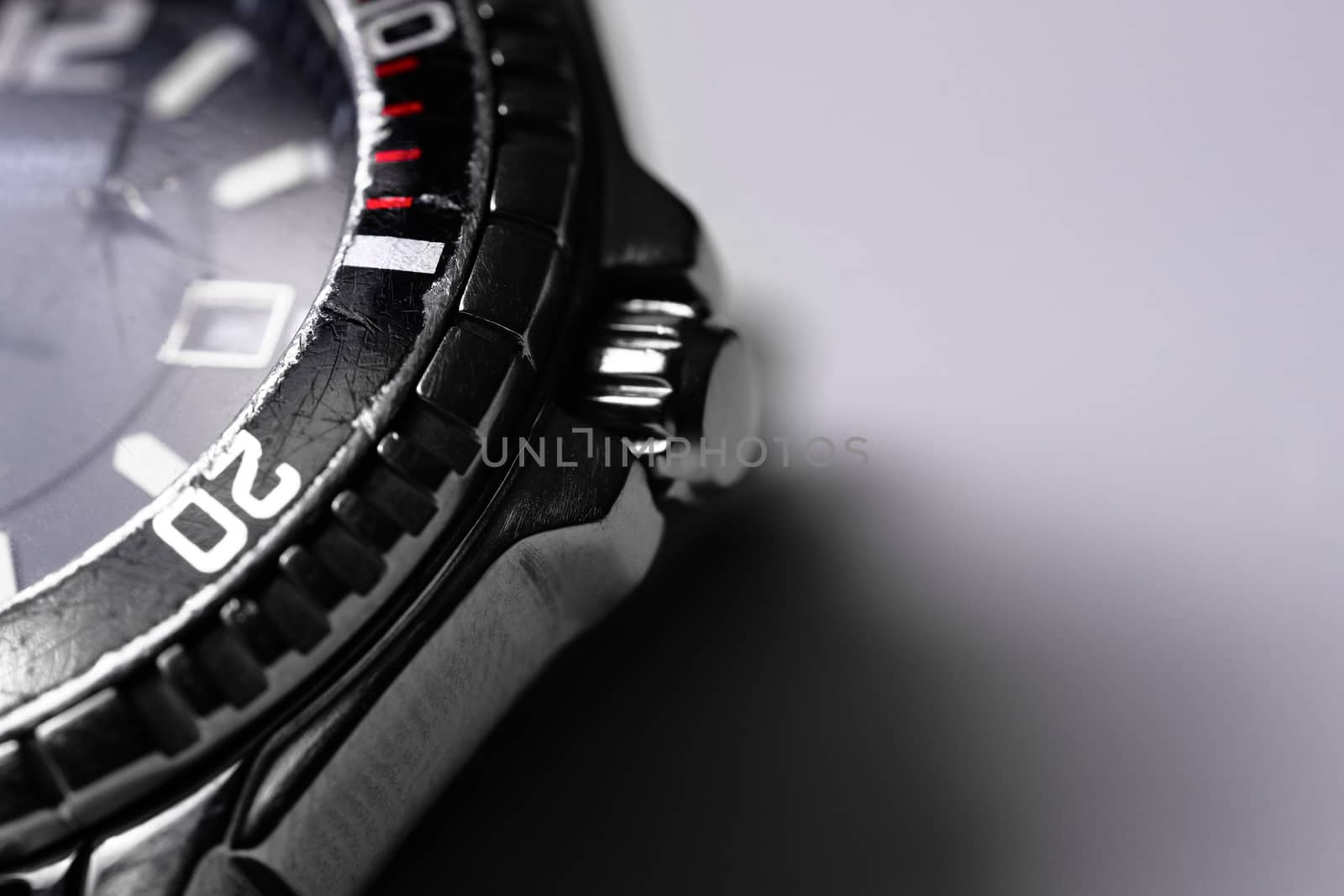 Diver watch case part closeup on white background. by alexsdriver