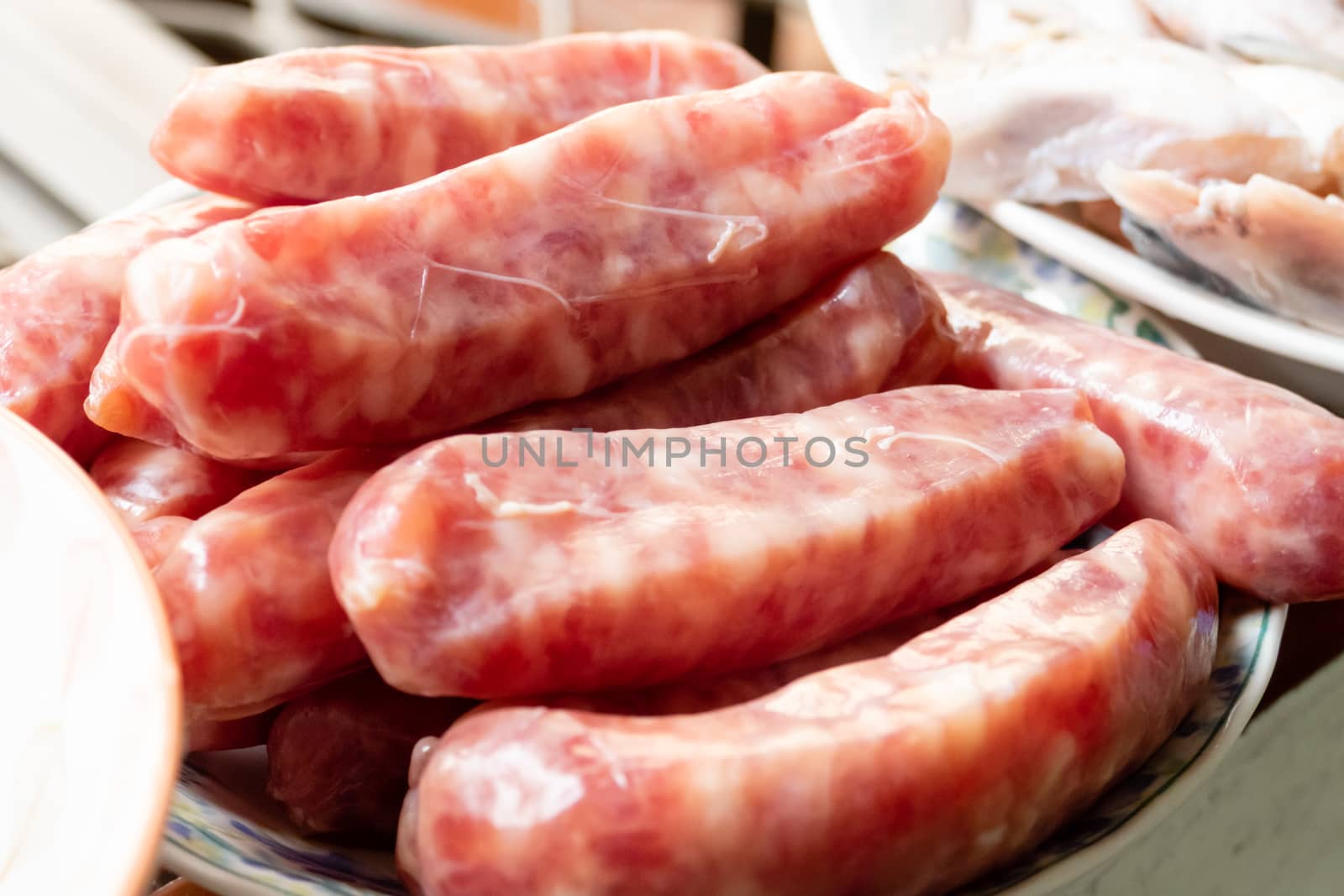 Raw Taiwanese sausage piled in plate