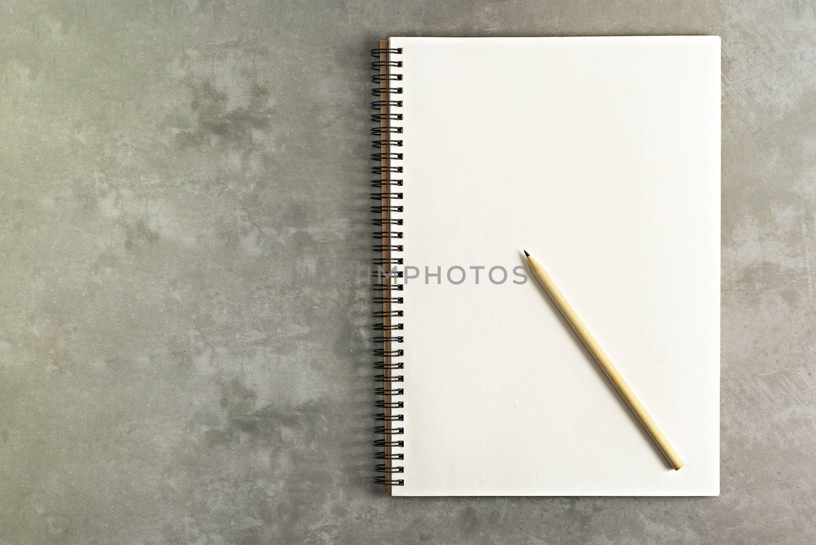 blank sketchbook and pencil by rakratchada