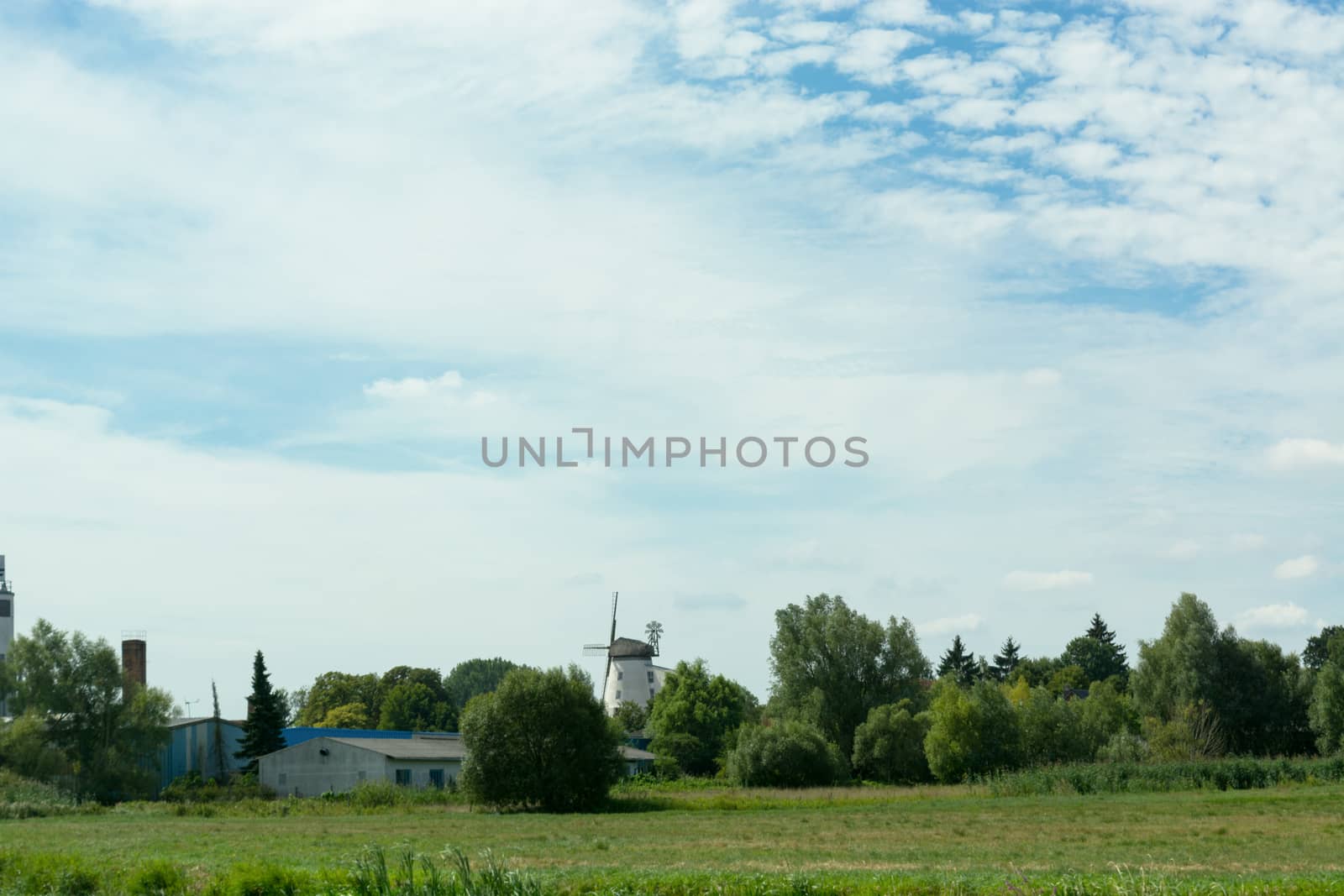 Scenic panorama with windmill         by JFsPic