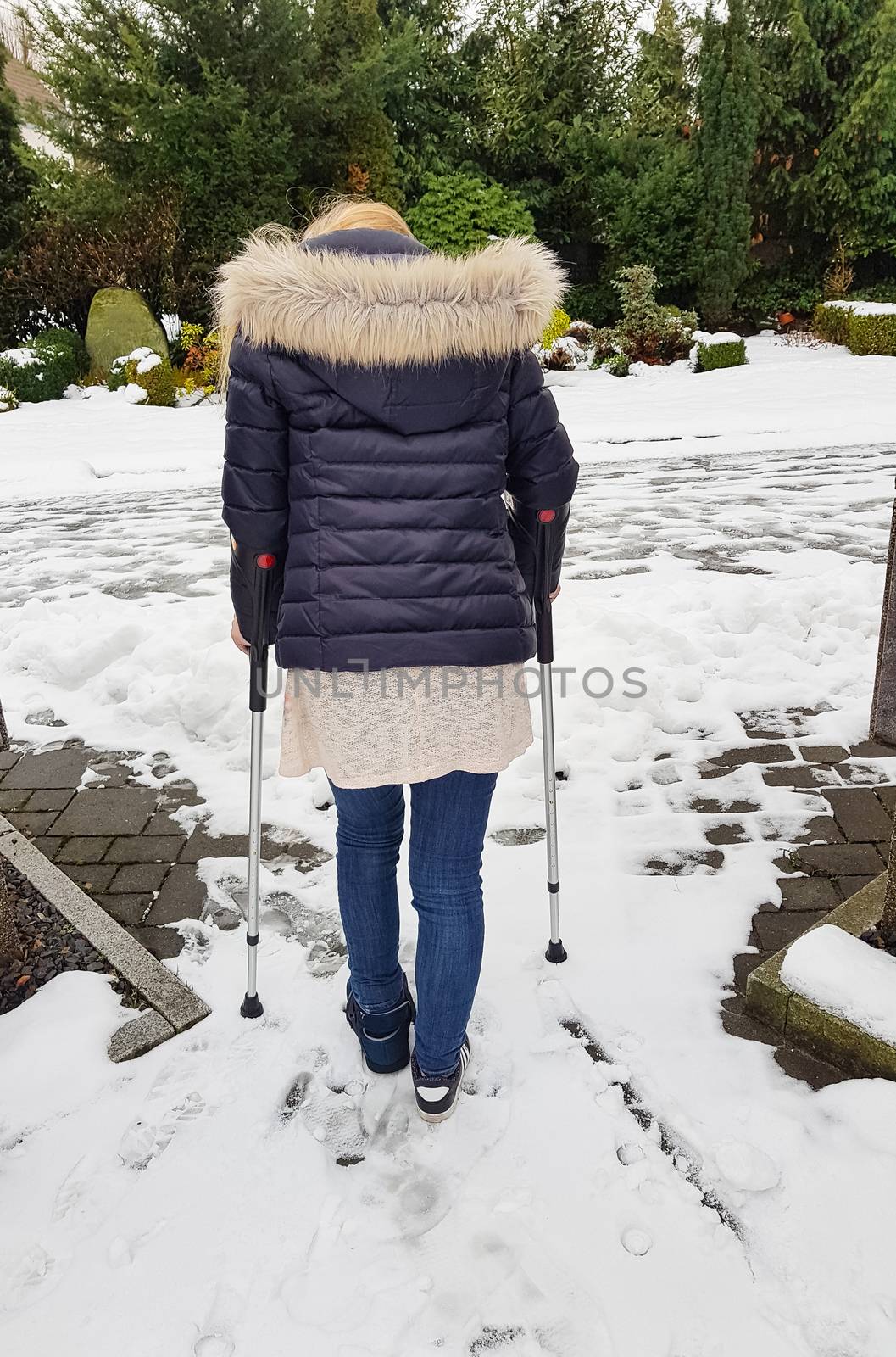 Woman with crutches  by JFsPic