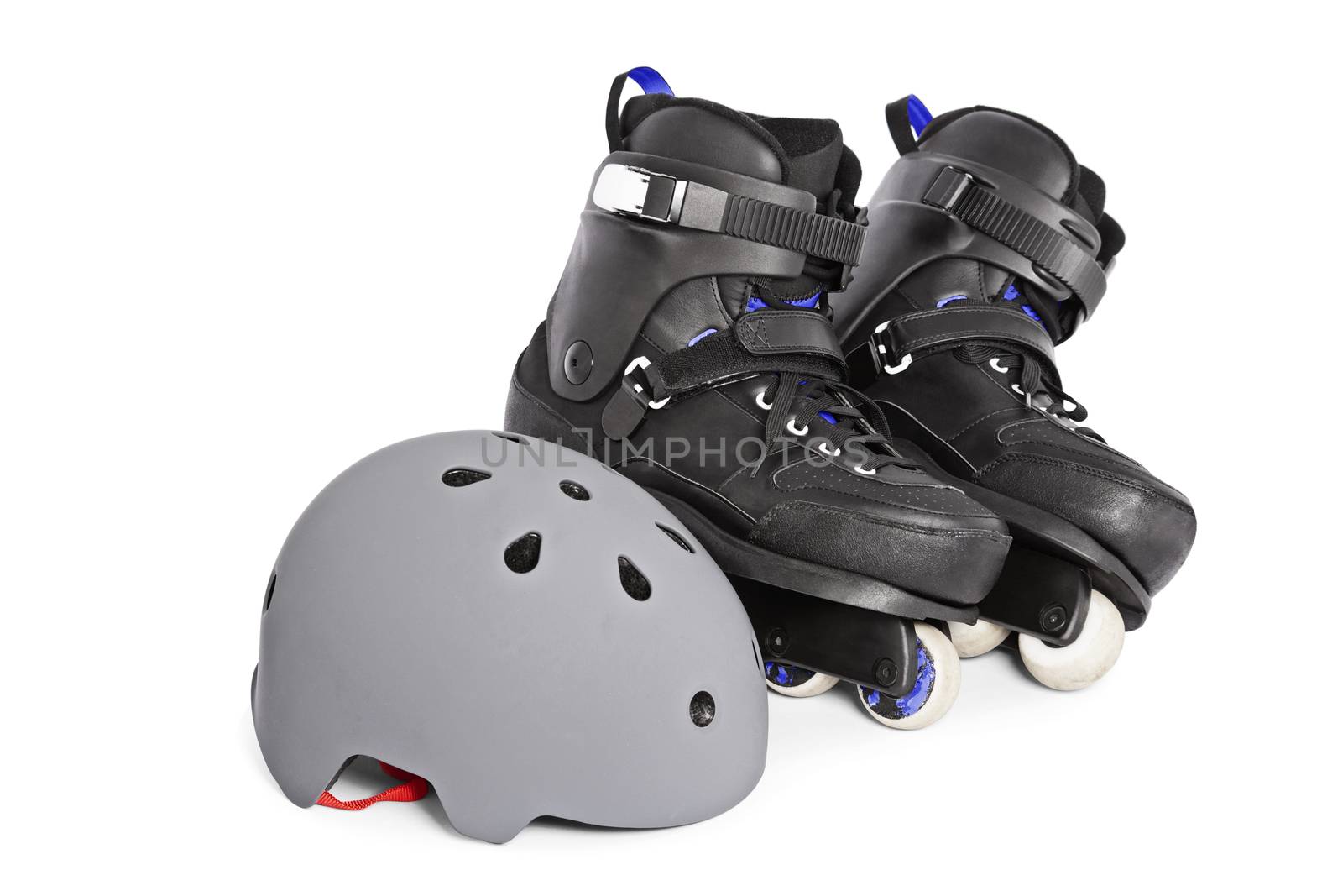 Close up of aggressive inline skates and a helmet by Mendelex