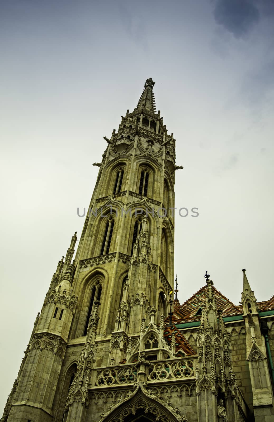 Bottom up view of the spire of Matthias Church in the Fisherman's Bastion in Budapest.