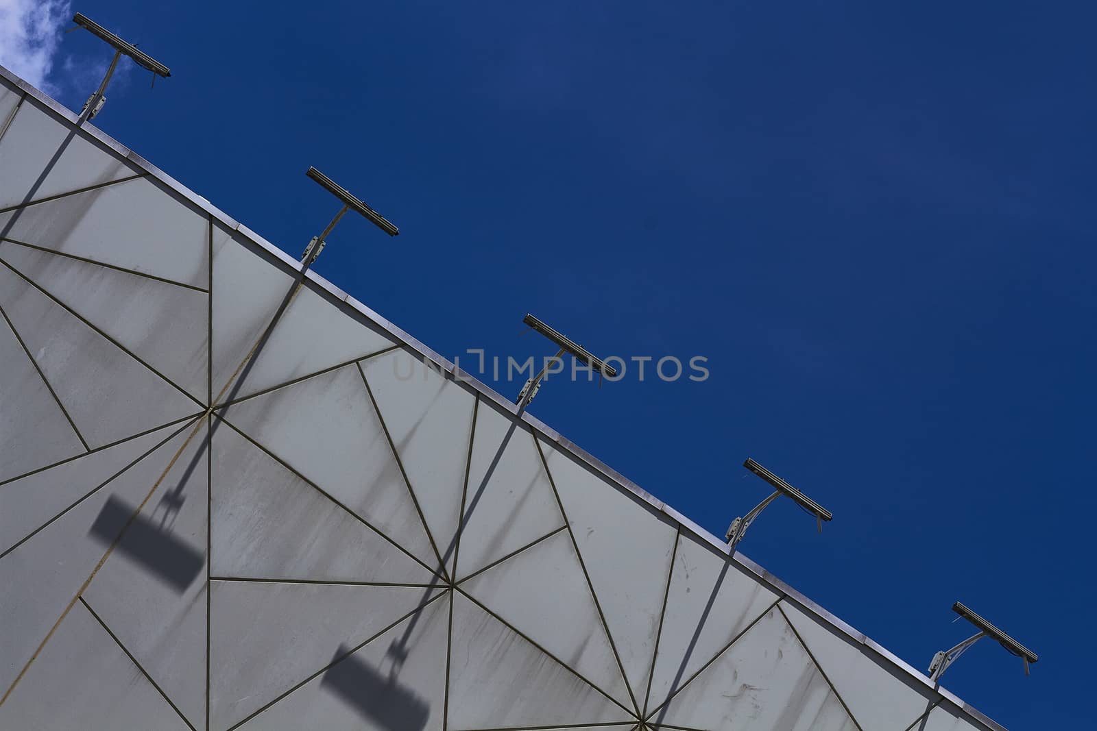 repeating concrete structure and blue sky