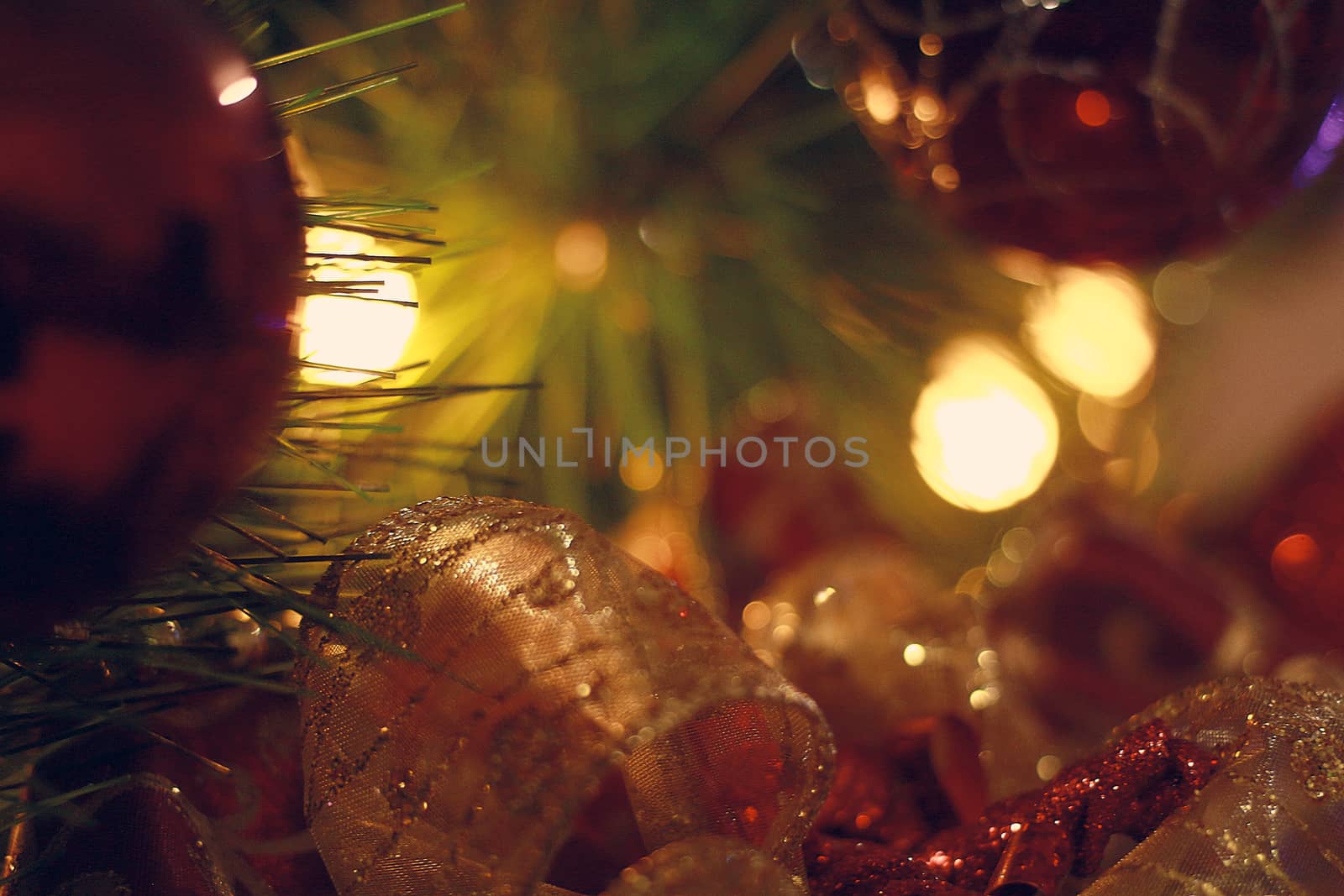 Christmas spheres and lights in dark tones and cat