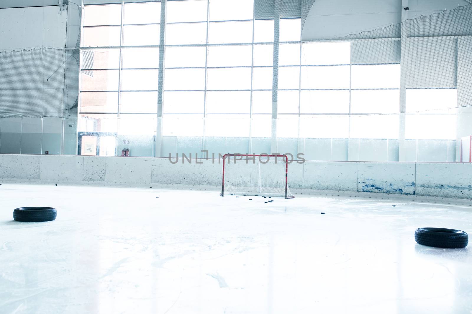 ice hockey ice rink and empty red net