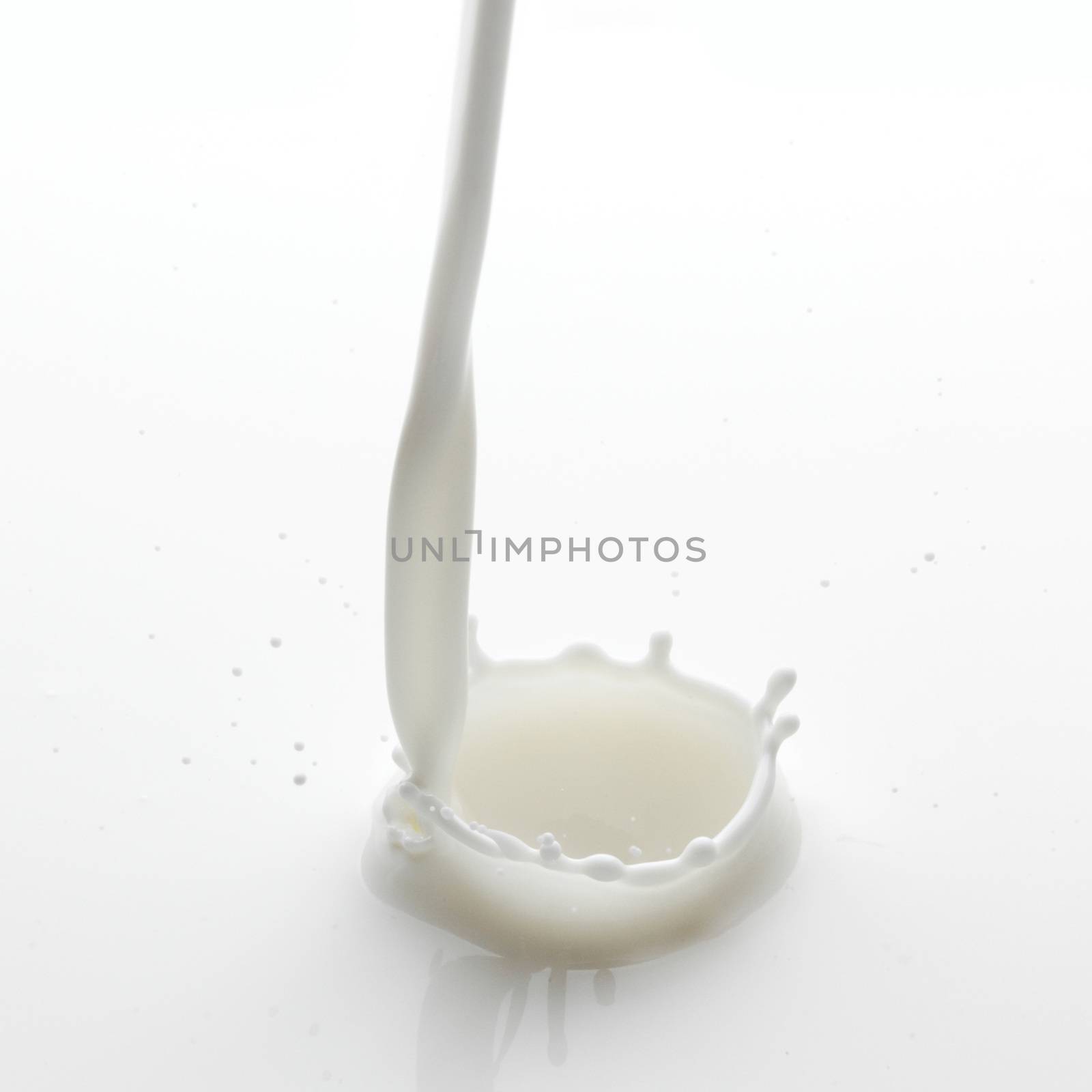 Pouring milk splash by Yellowj