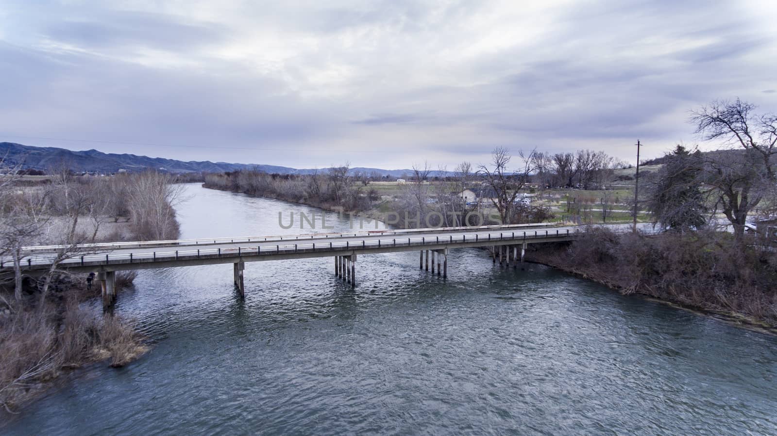 Two lane bridge over the water of a river