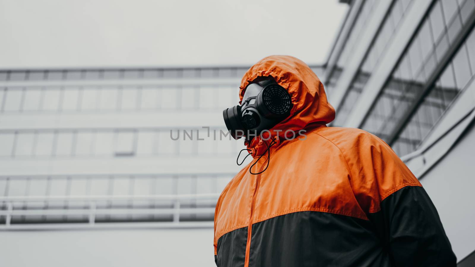 Protection respirator half mask for toxic gas.The man prepare to wear protection air pollution in the chemical industry