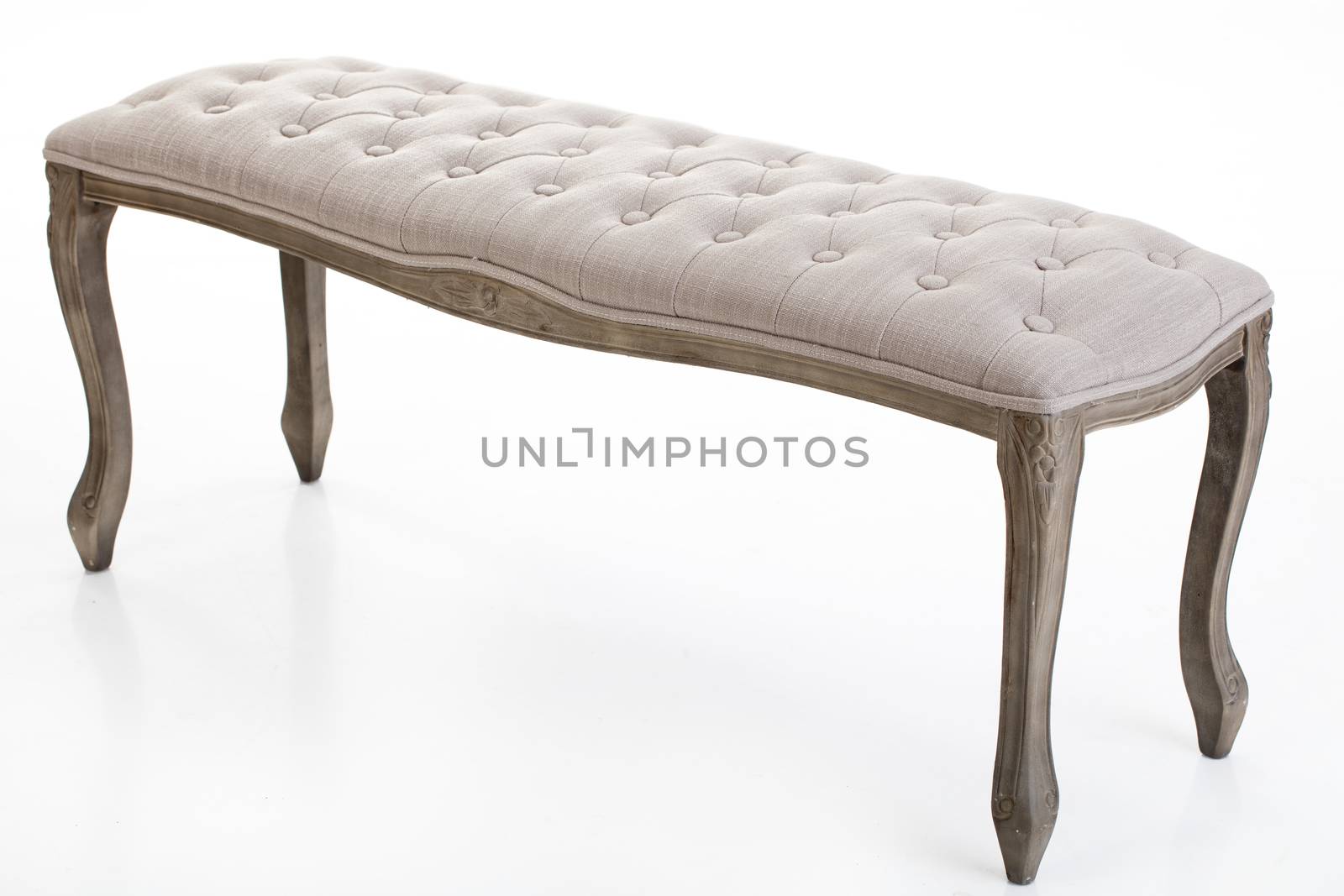 Old wooden bench on an isolated studio background