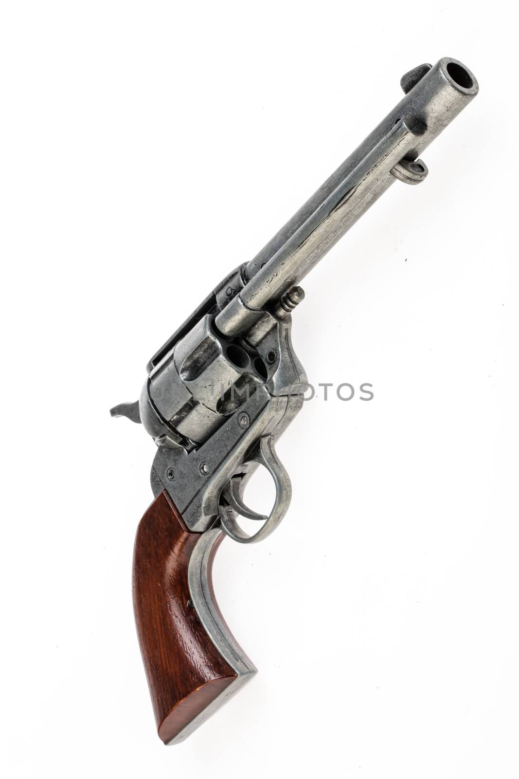 Old revolver on an isolated studio background