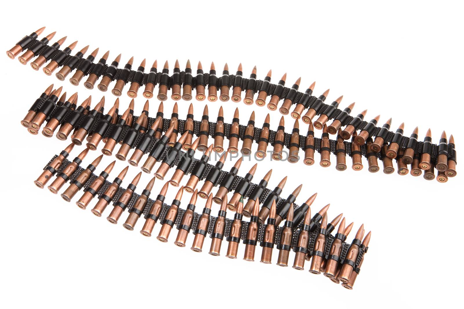 Metal belt with machinegun cartridges on isolated background