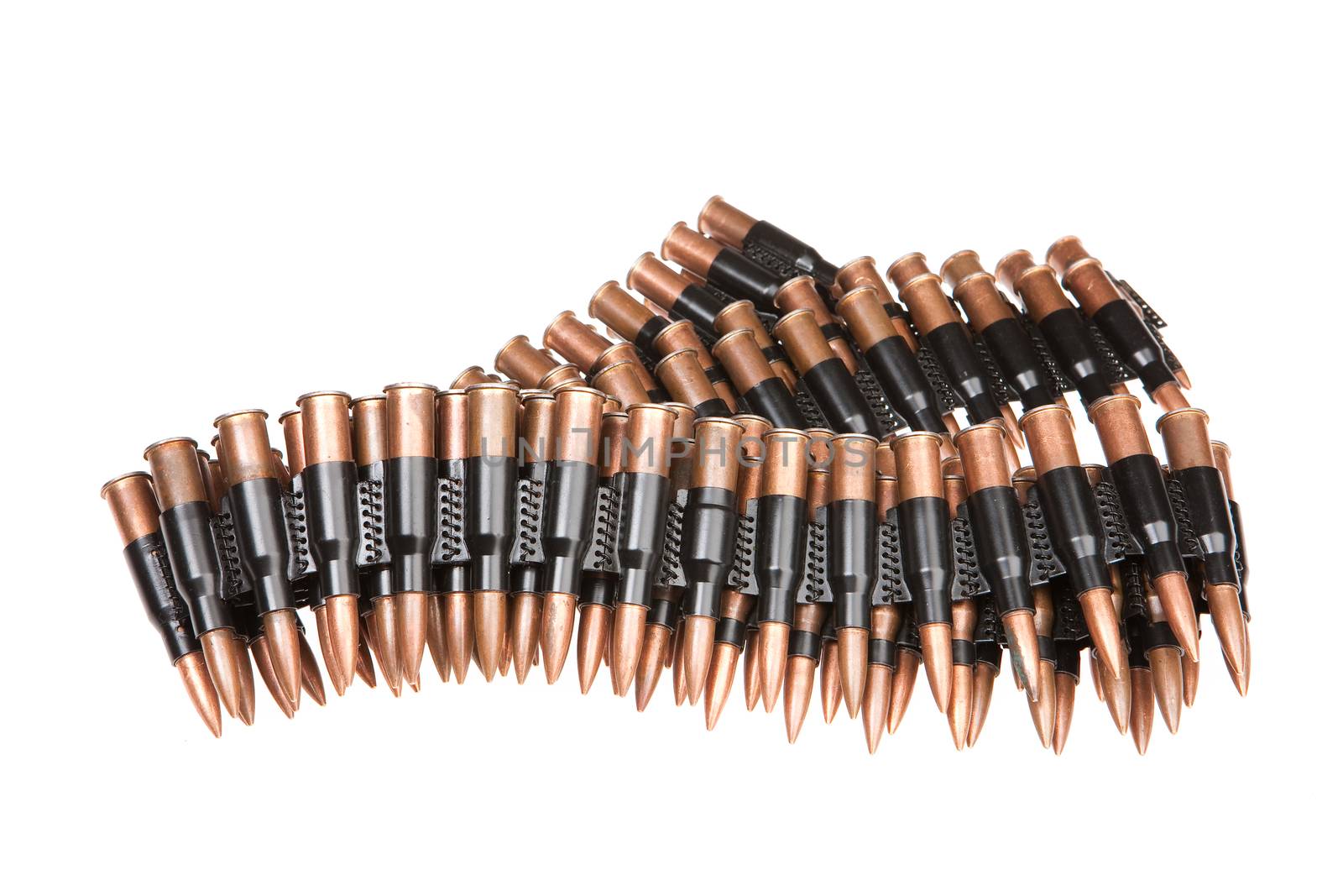 Metal belt with machinegun cartridges on isolated background