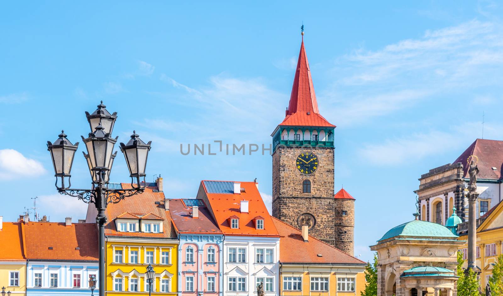 Colorful renaissance houses and Valdice Gate at Wallenstein Square in Jicin, Czech Republic.