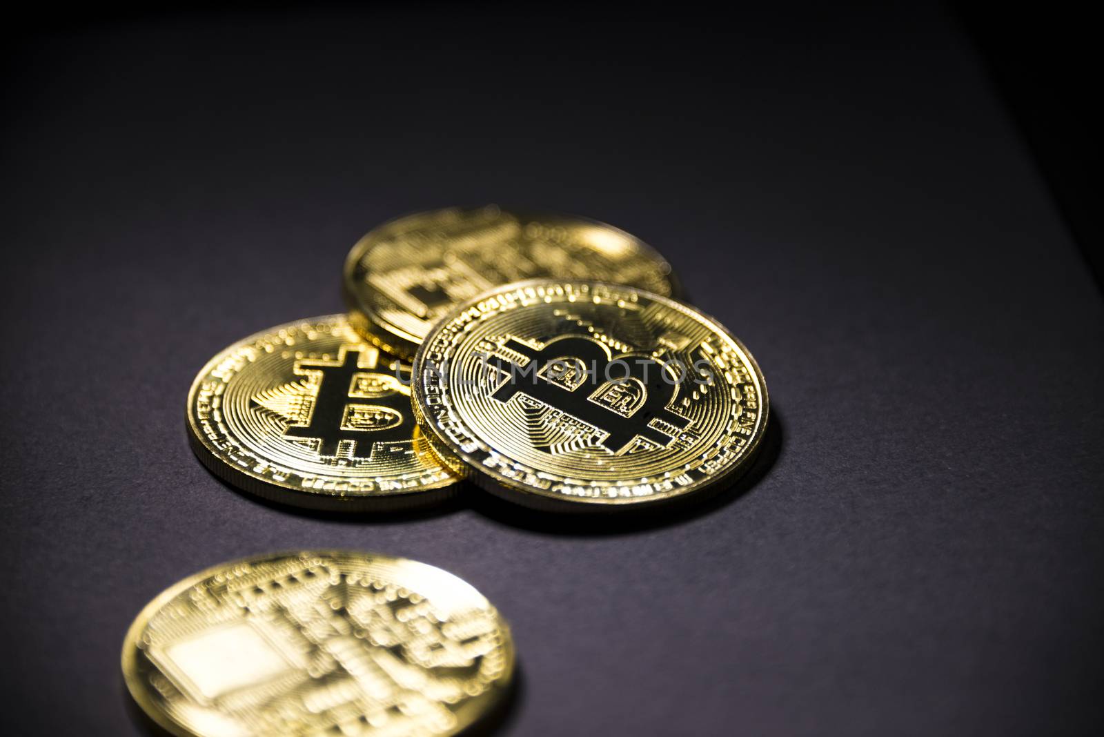 Gold coin Bitcoin on dark background. Cryptocurrency. by butenkow