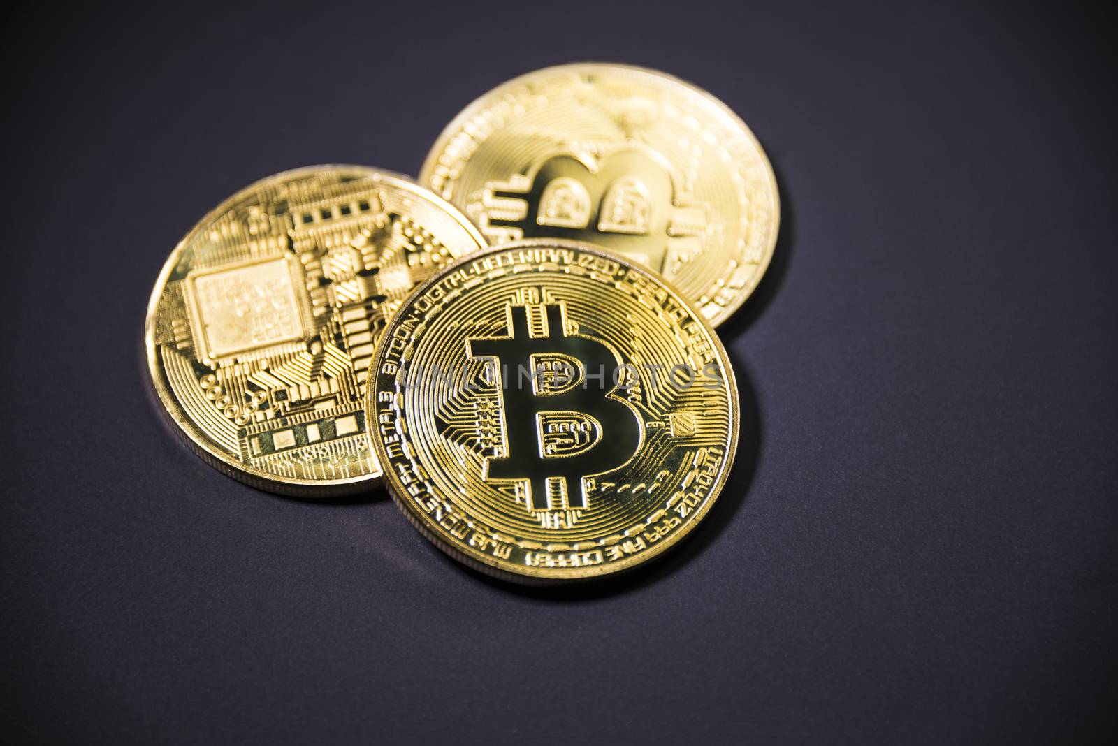 Gold coin Bitcoin on dark background. Cryptocurrency