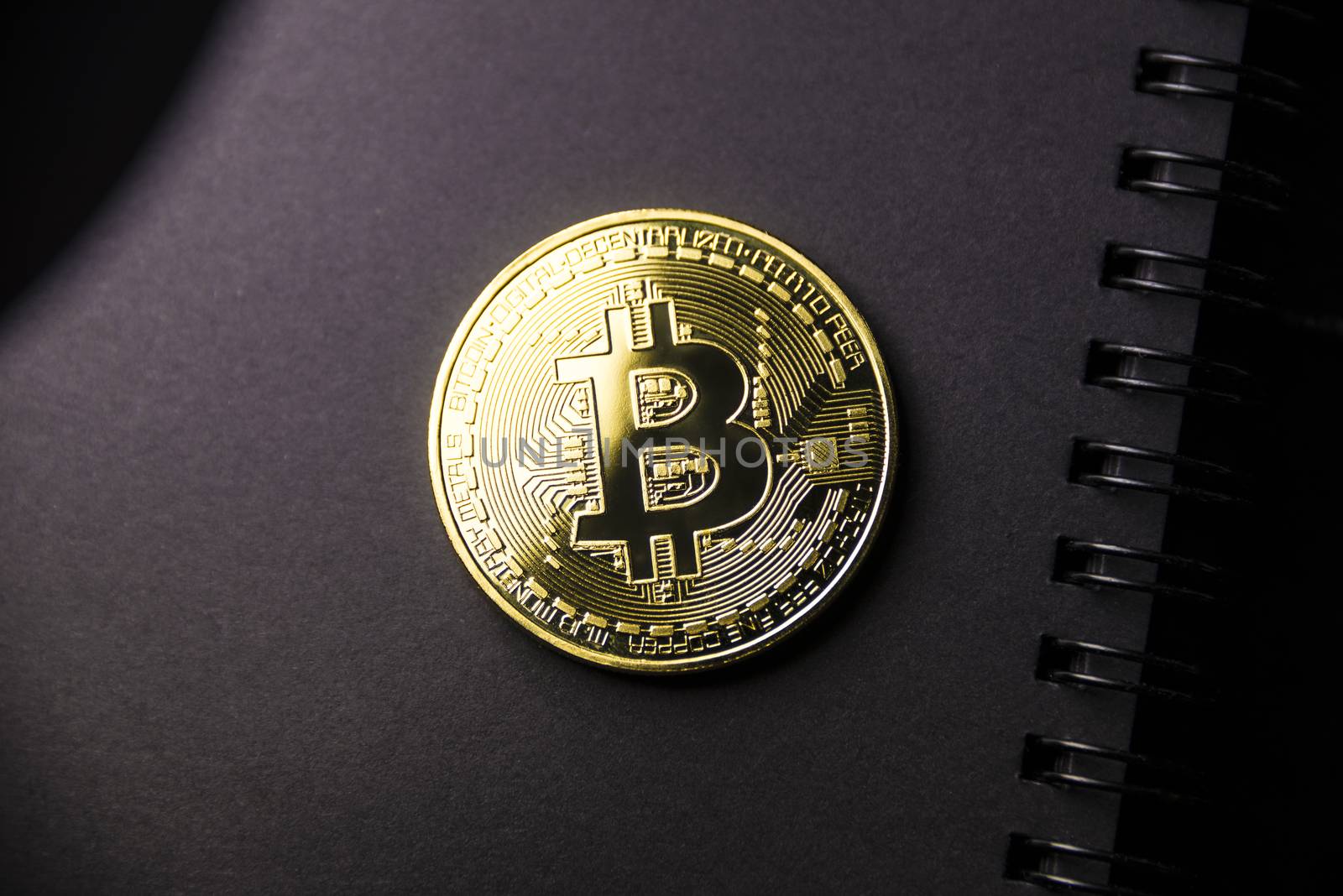 Gold coin Bitcoin on dark background. Cryptocurrency