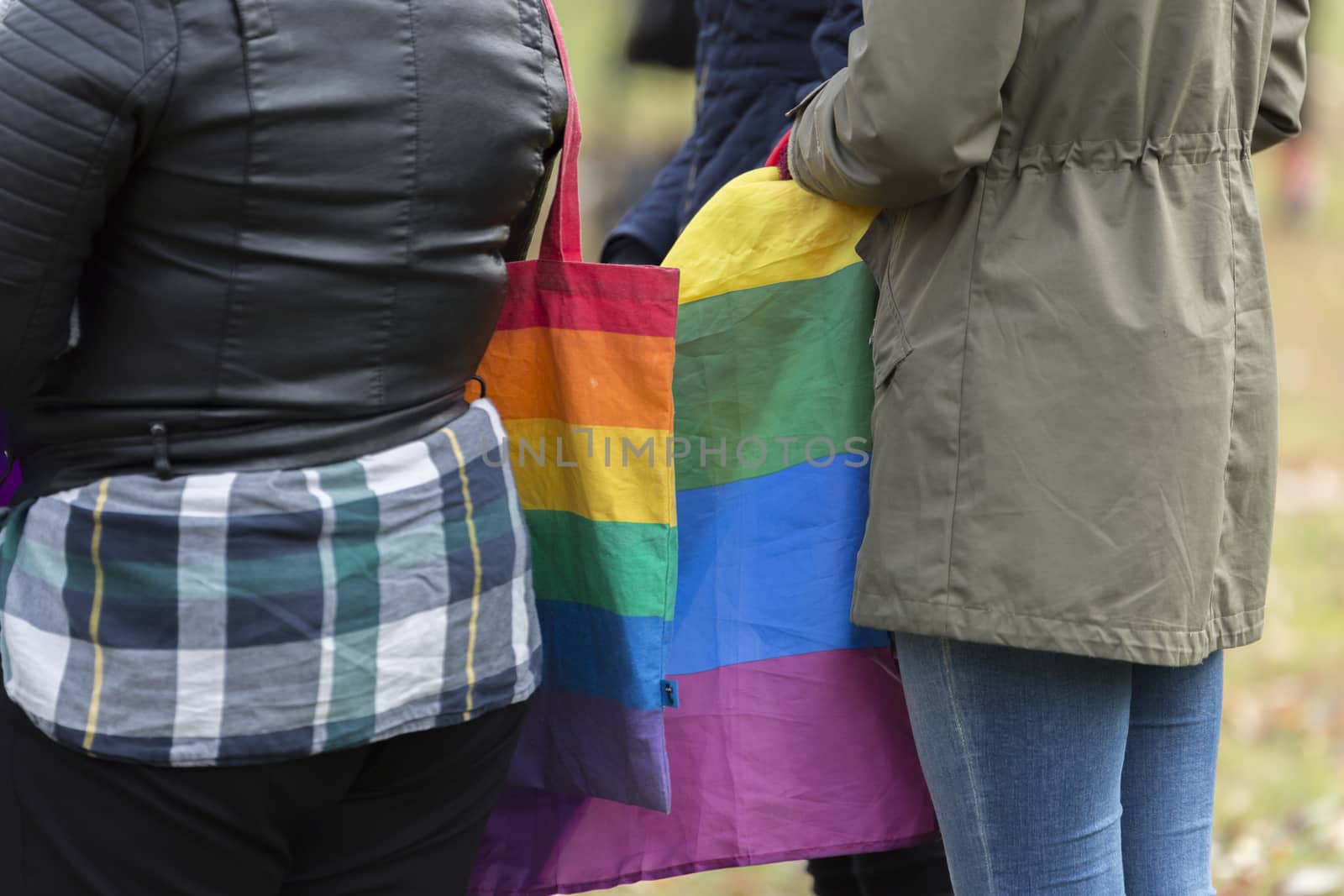 Girls with Rainbow Flag and Bag.