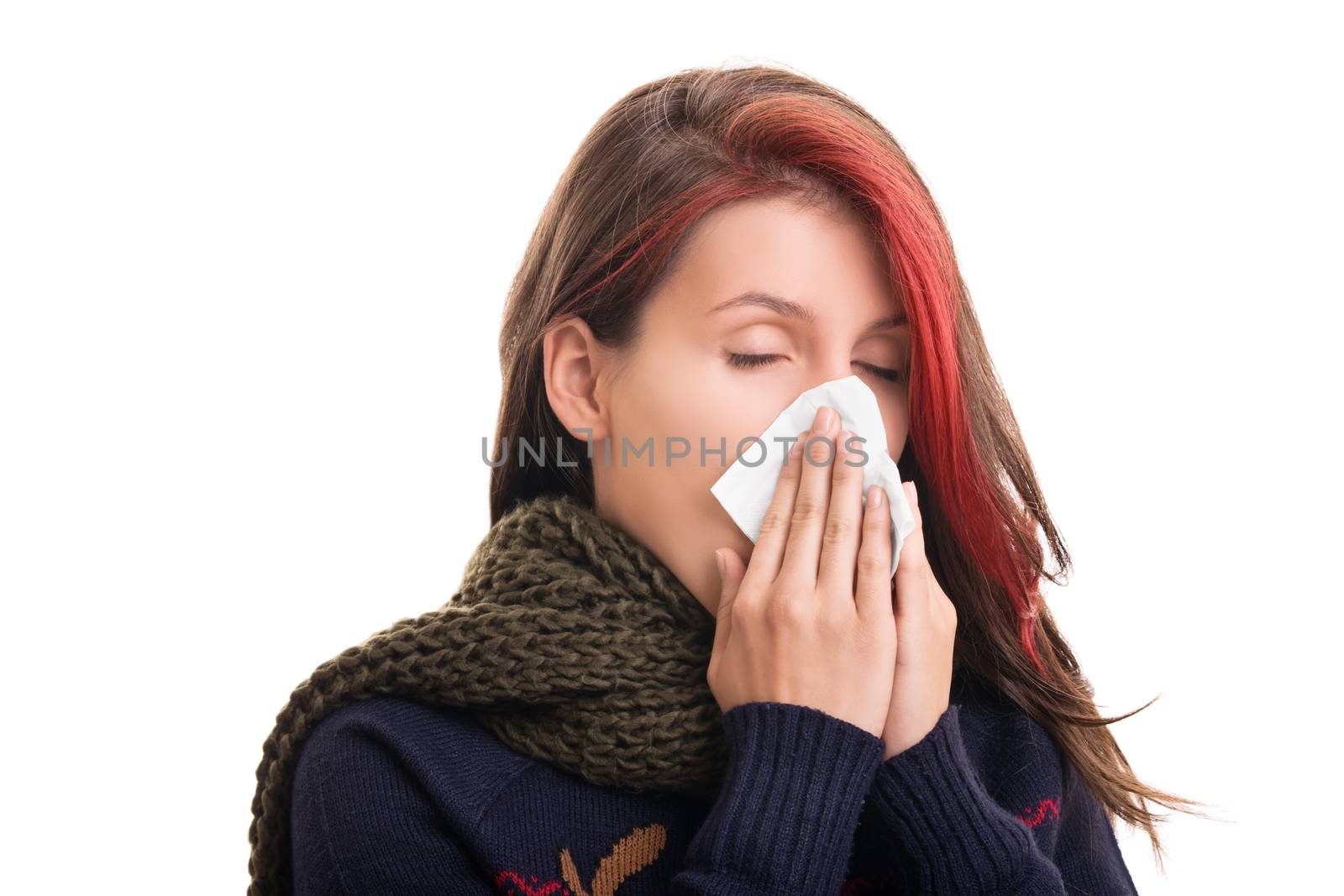 Portrait of a girl in winter clothes blowing her nose by Mendelex