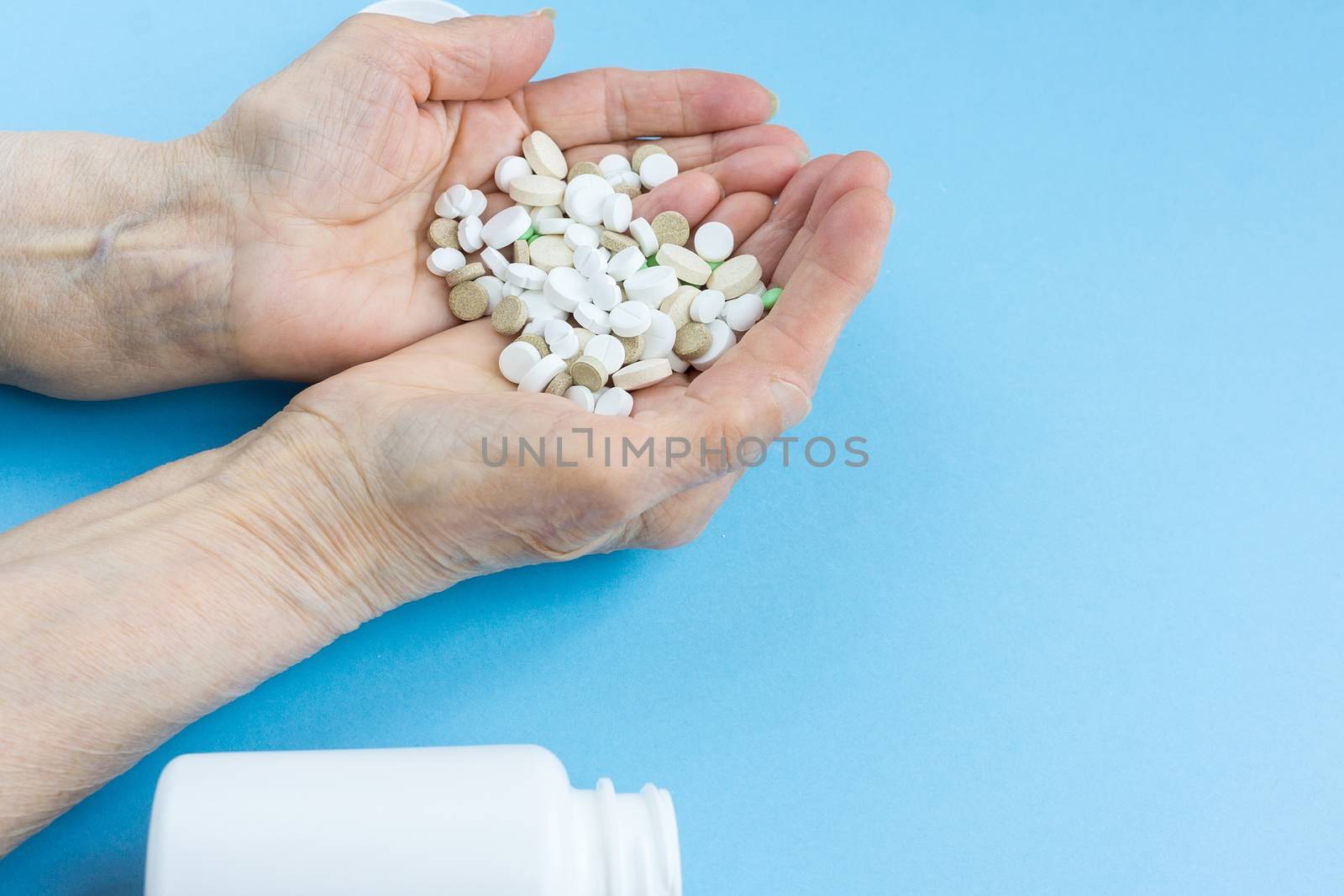 pills on a blue background by AlexBush