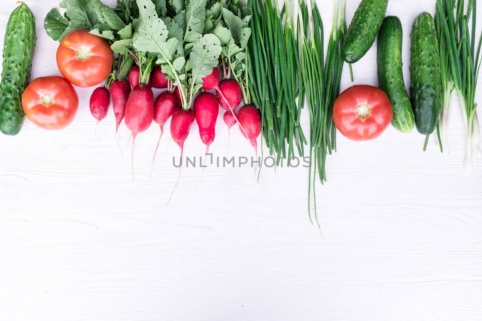 Fresh vegetables from the garden on a white background