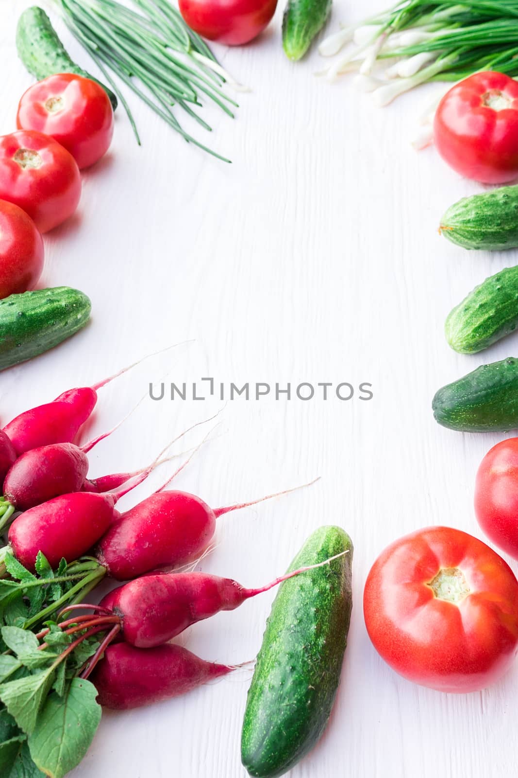 Fresh vegetables from the garden on a white background