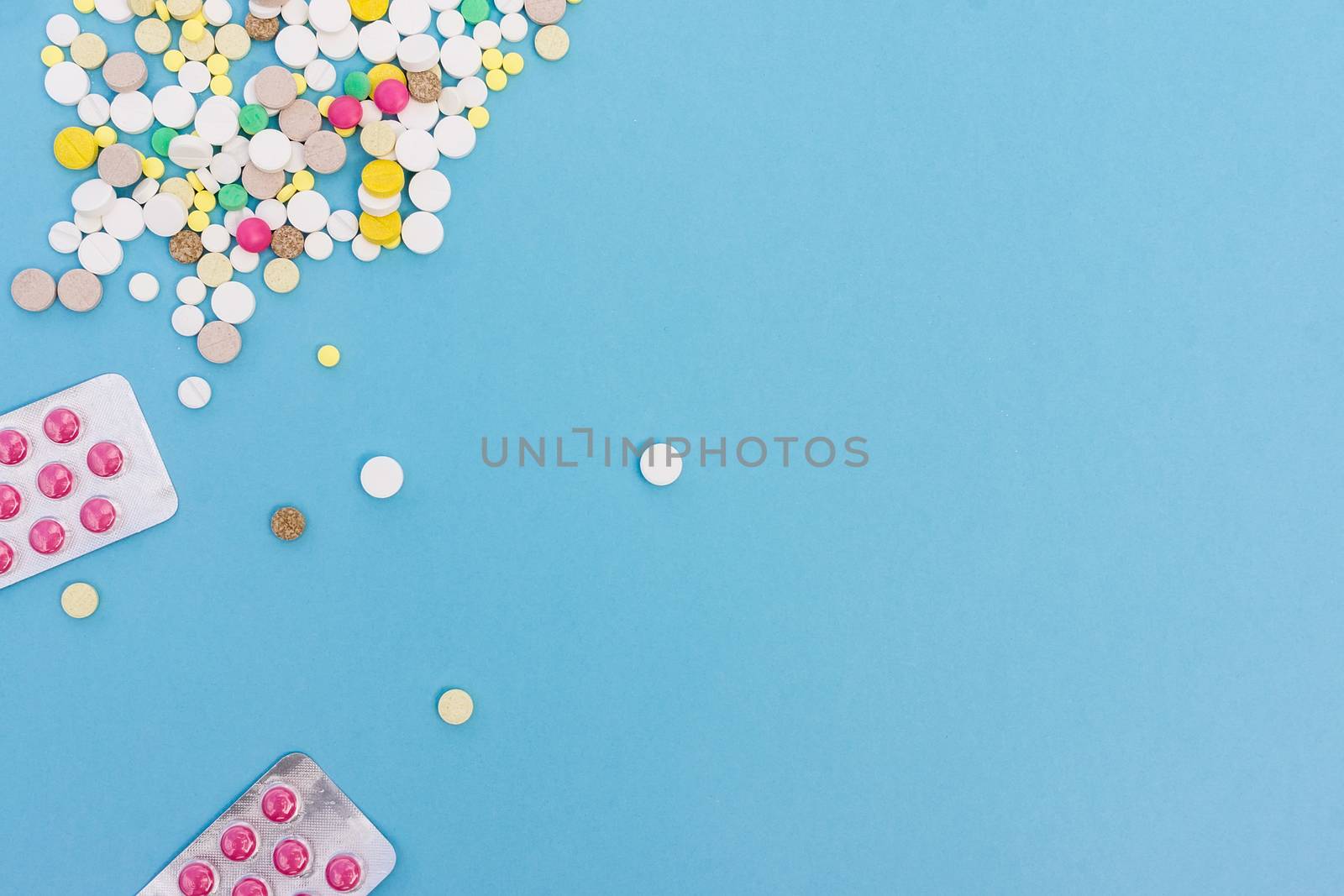 pills on a blue background by AlexBush