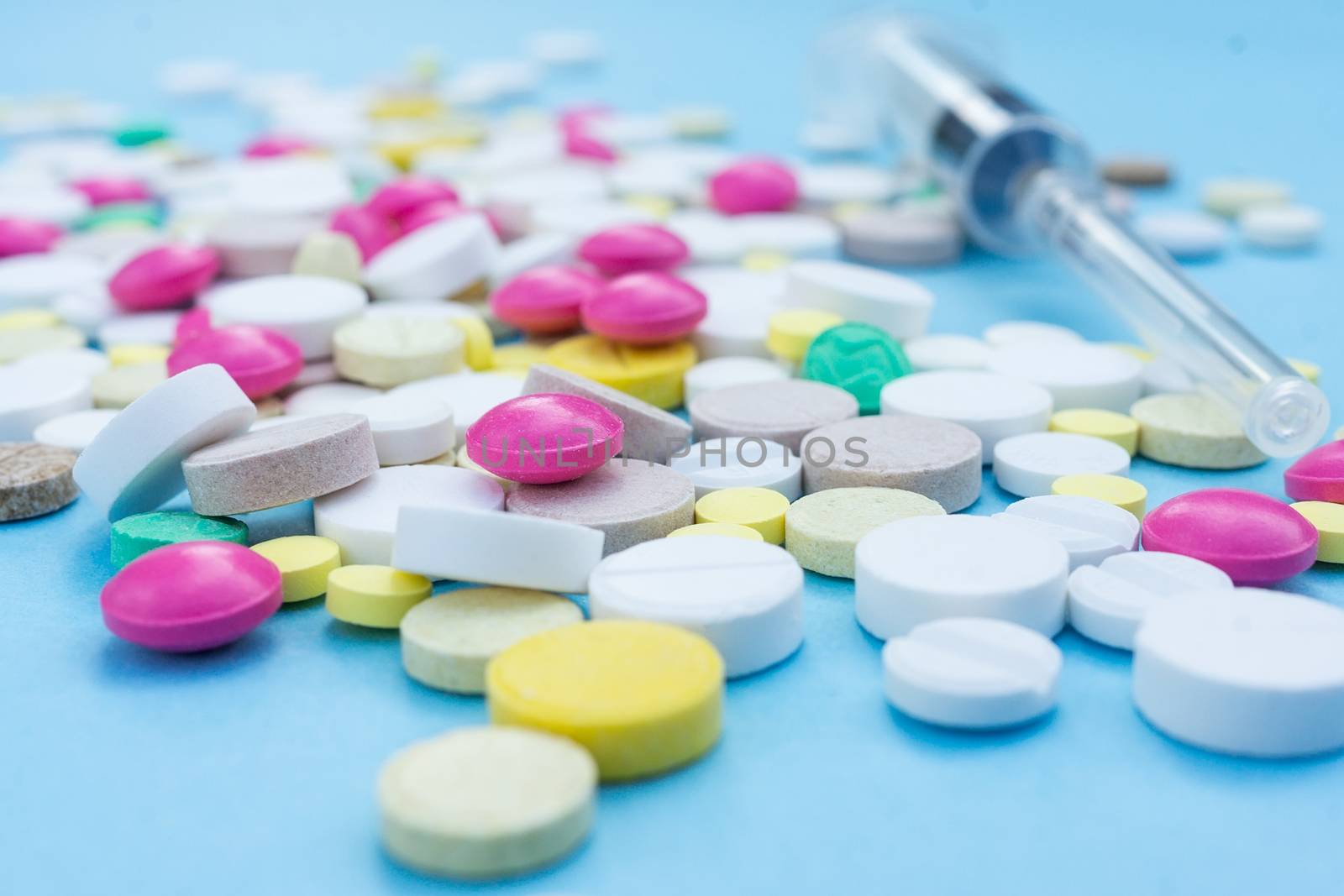 pills on a blue background by AlexBush