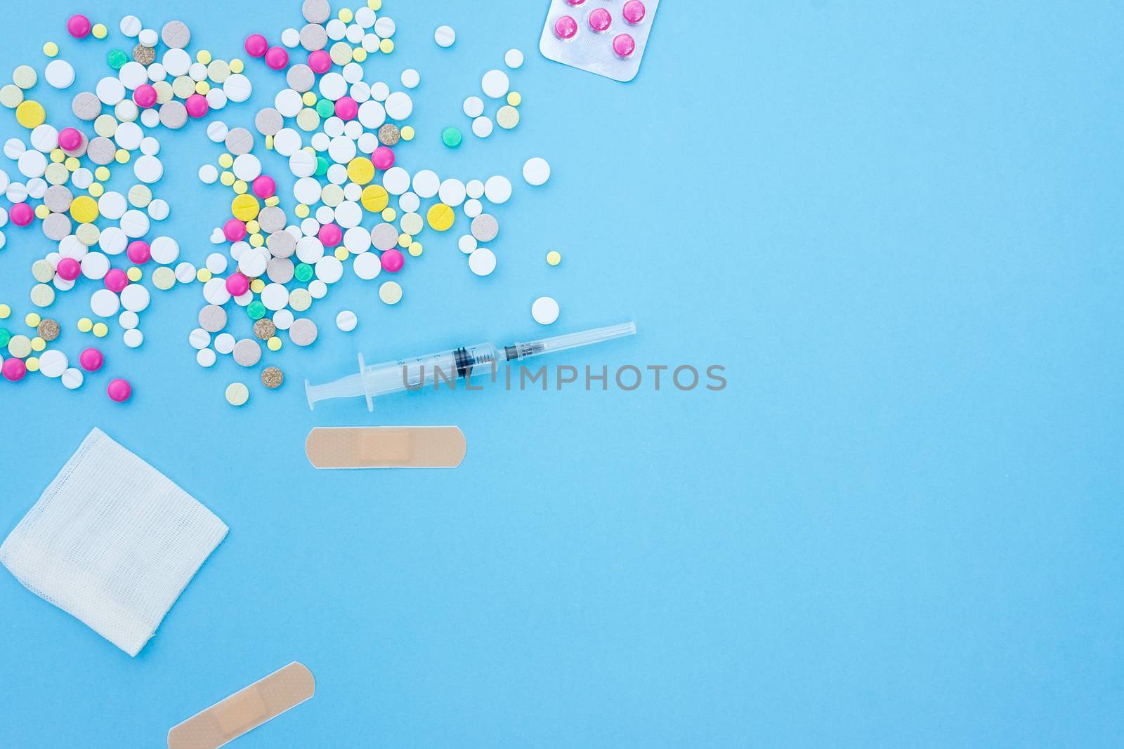 pills on a blue background by AlexBush