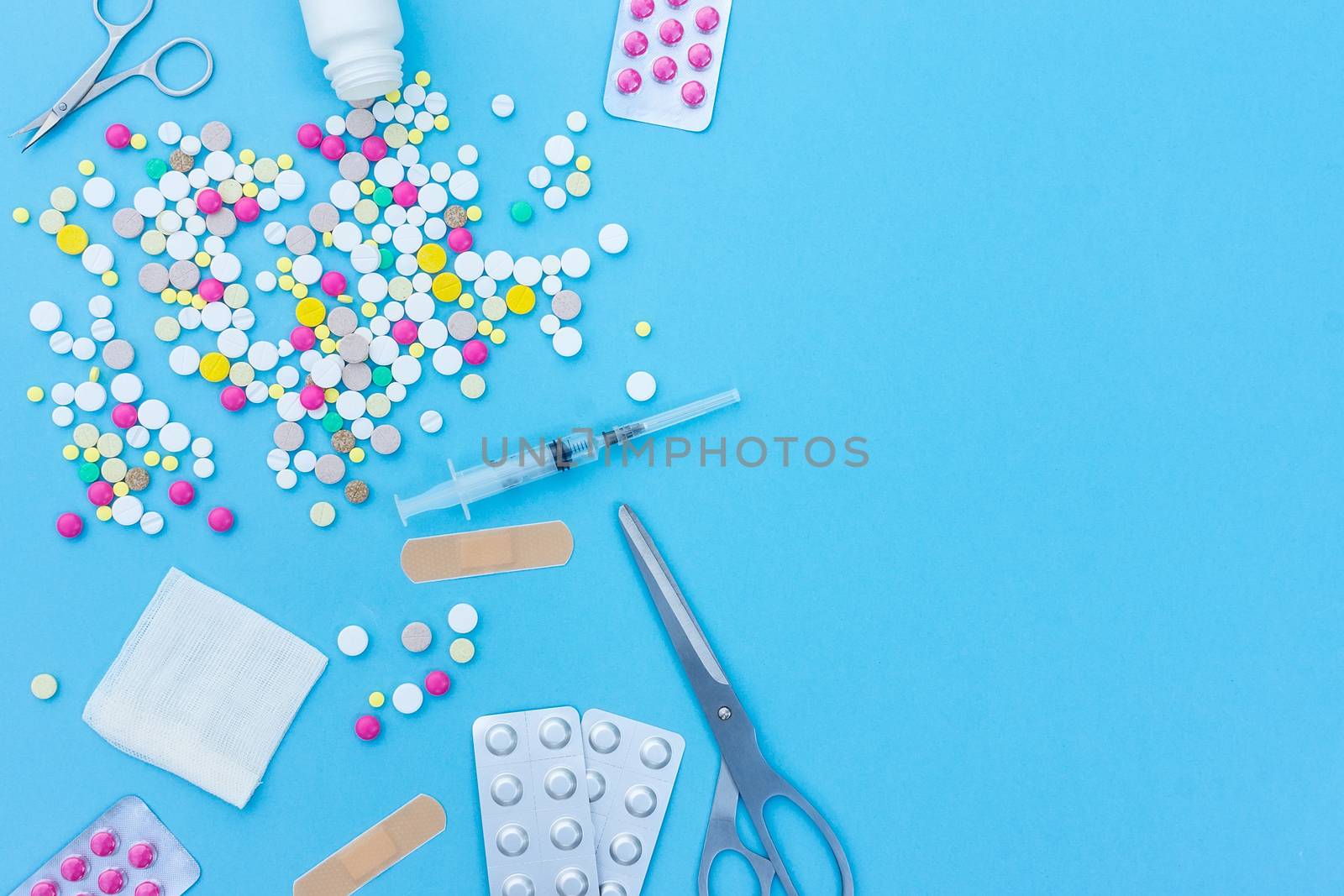 pills on a blue background by AlexBush