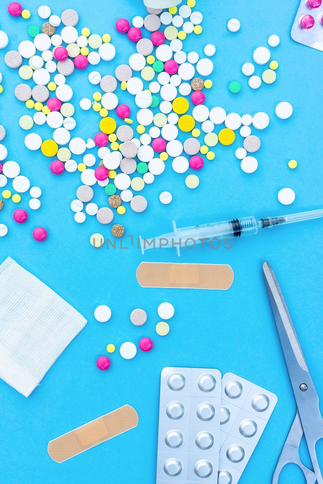 pills on a blue background by AlexBush