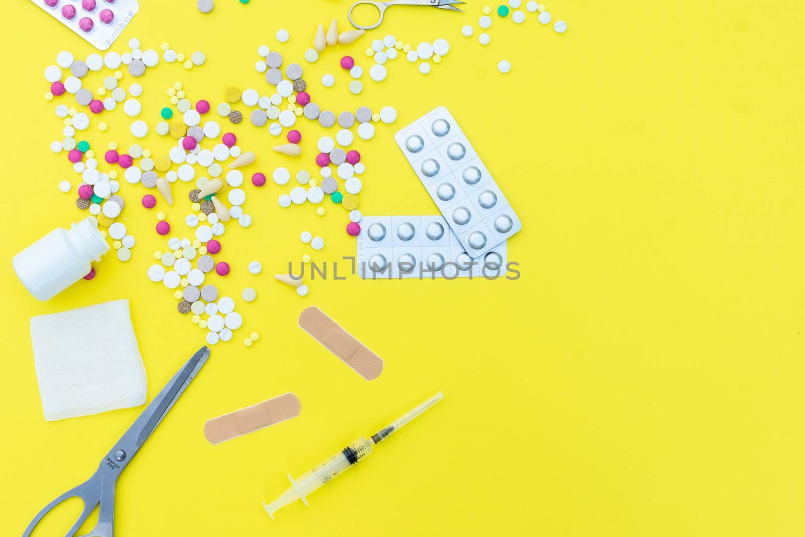 pills on a yellow background by AlexBush