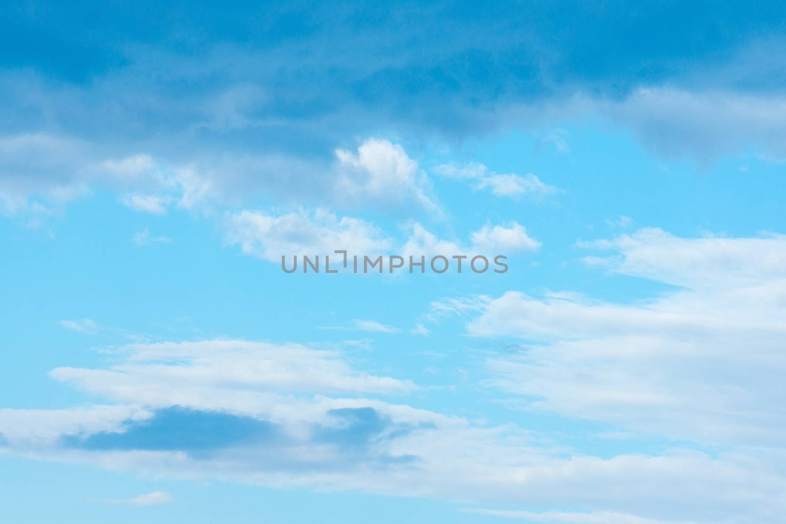 The sky in sunny summer weather, a cloudy background