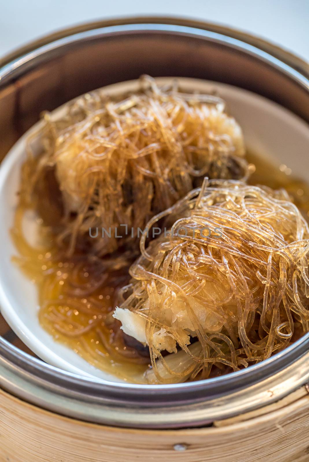 Chinese dim sum Sea Bass with vermicelli - Steamed Chinese groumet cuisine