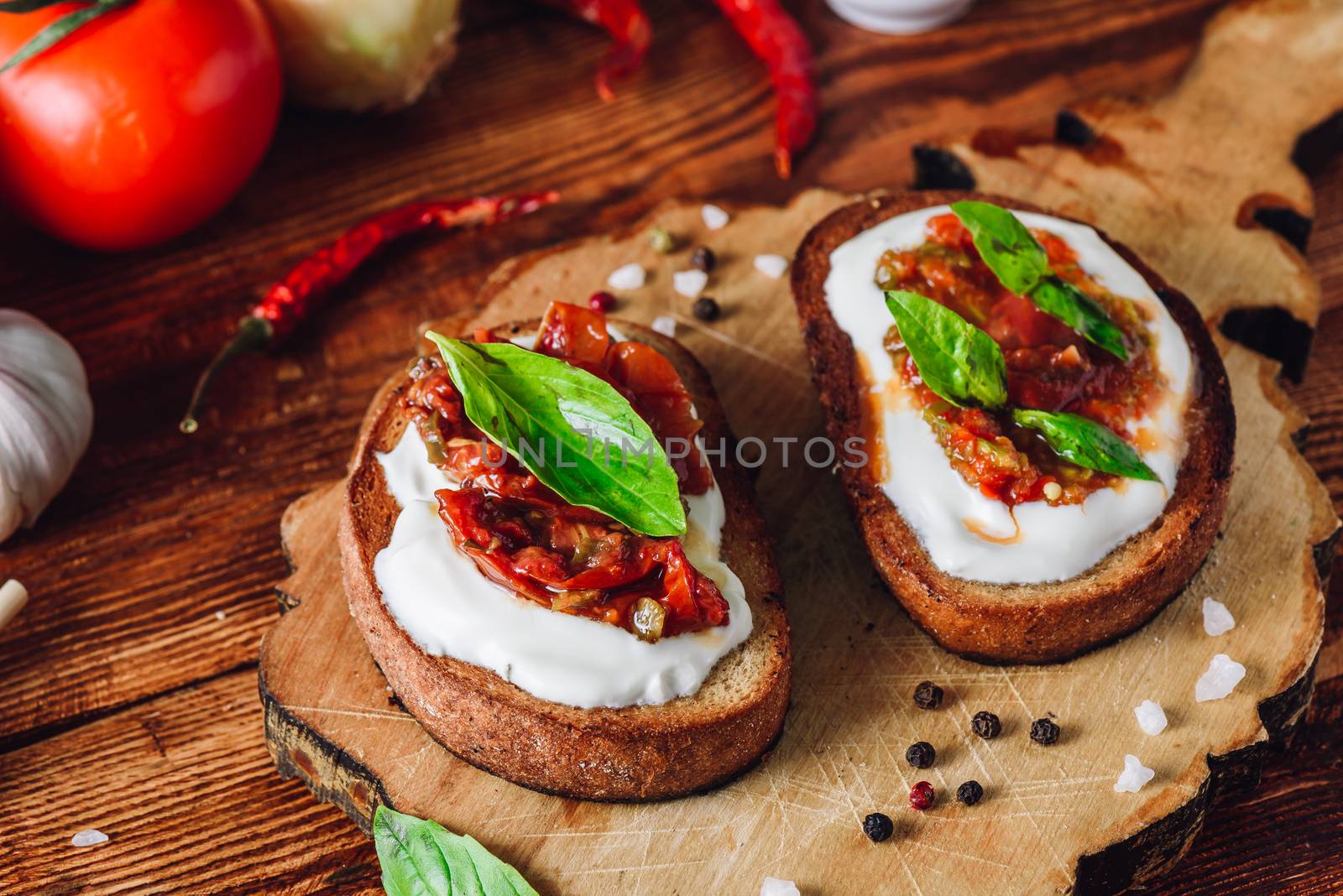 Bruschetta with Dried Tomatoes and Spicy Sauce by Seva_blsv