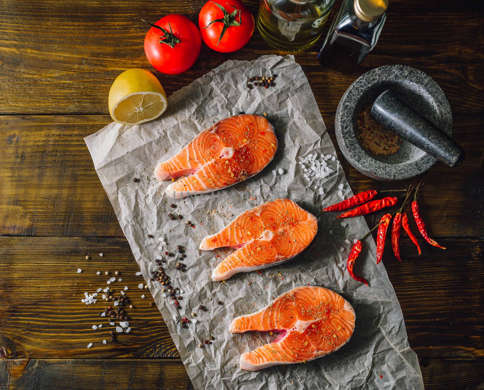 Salmon Seaks with Vegetables and Spices. Overhead View.