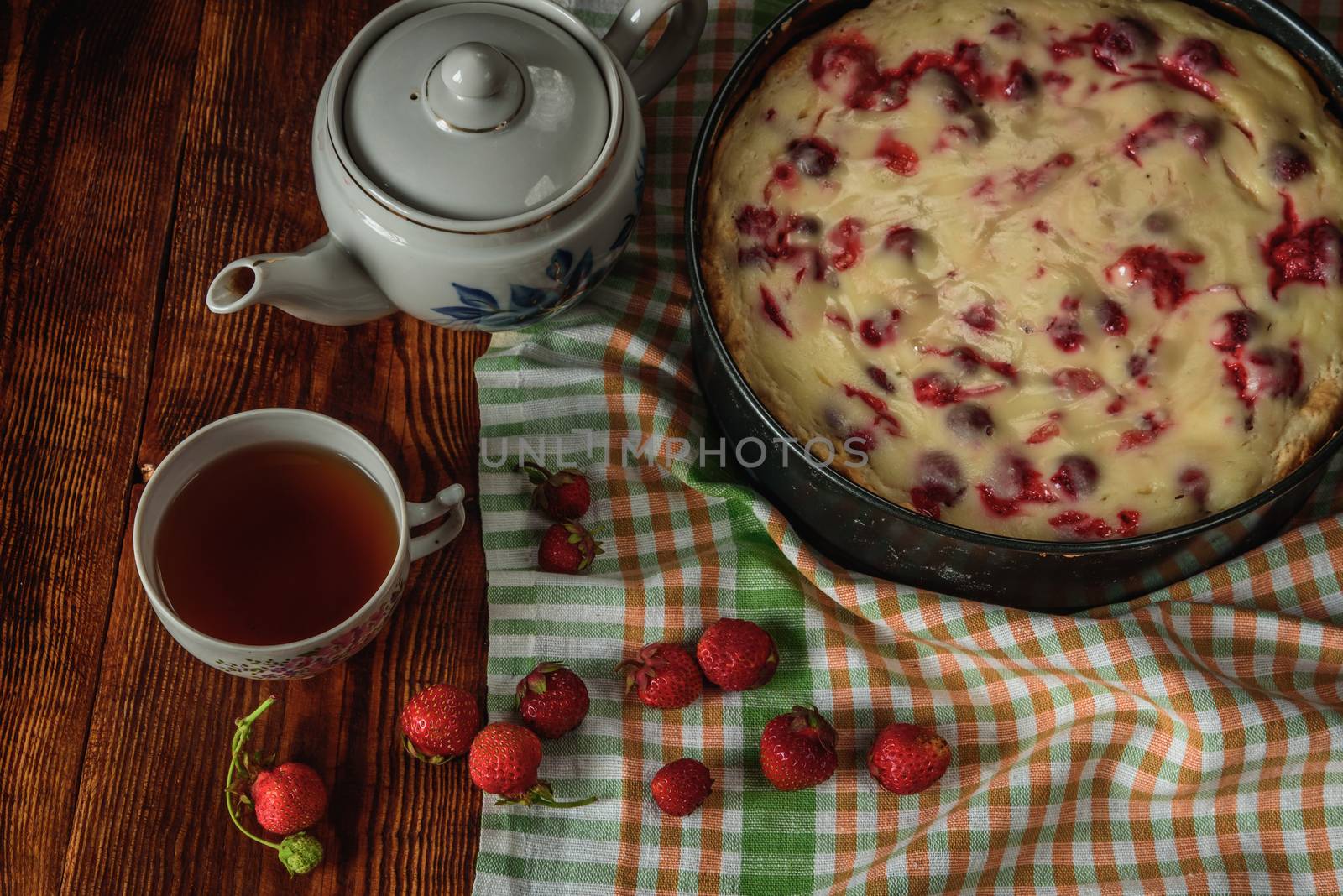 Breakfast with strawberry pie, black tea and berries by Seva_blsv
