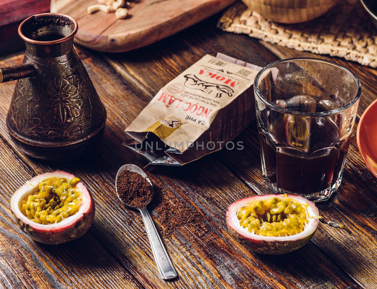 Glass of Turkish Coffee with Two Passion Fruit Halfs