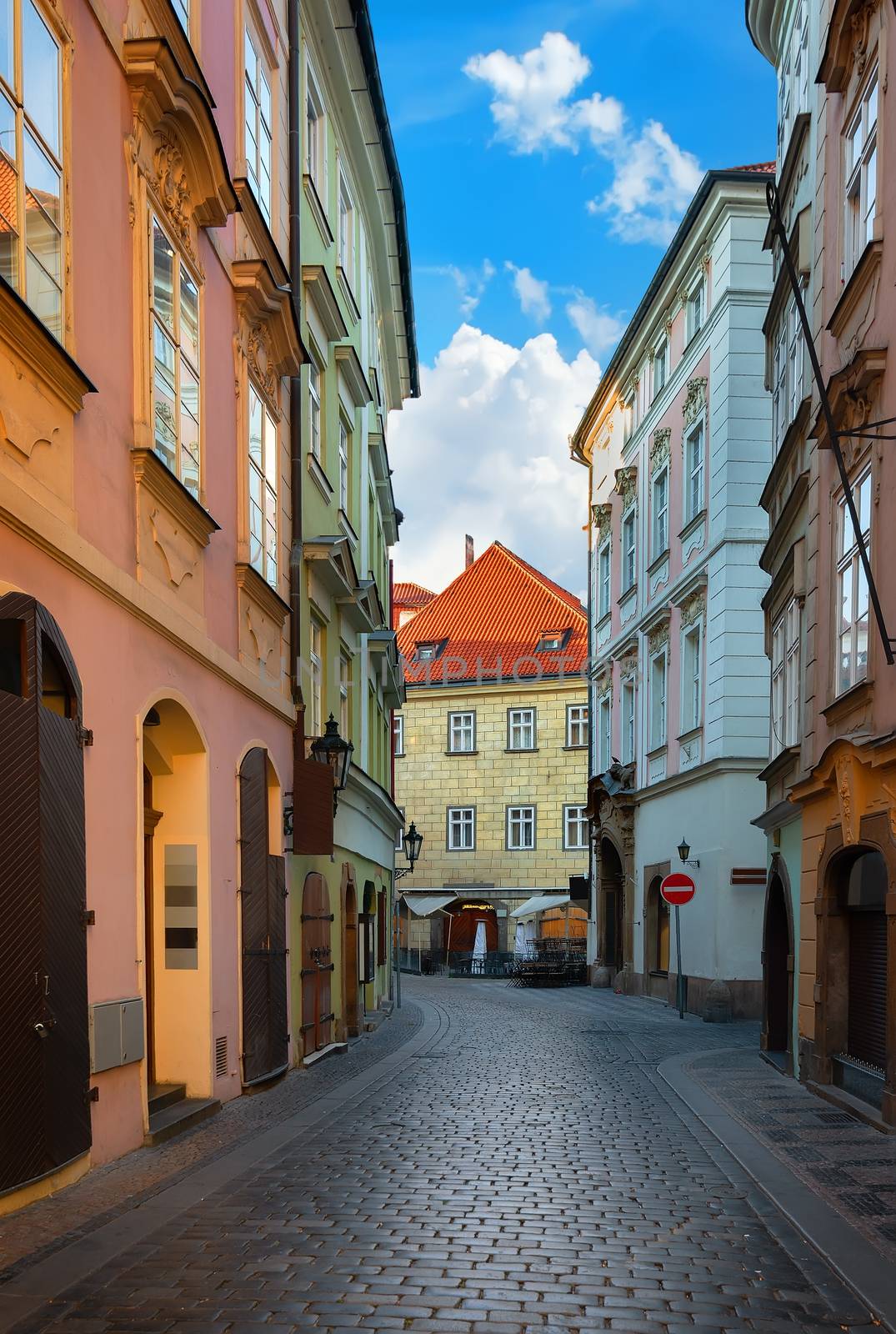 Old narrow street of Prague at dawn