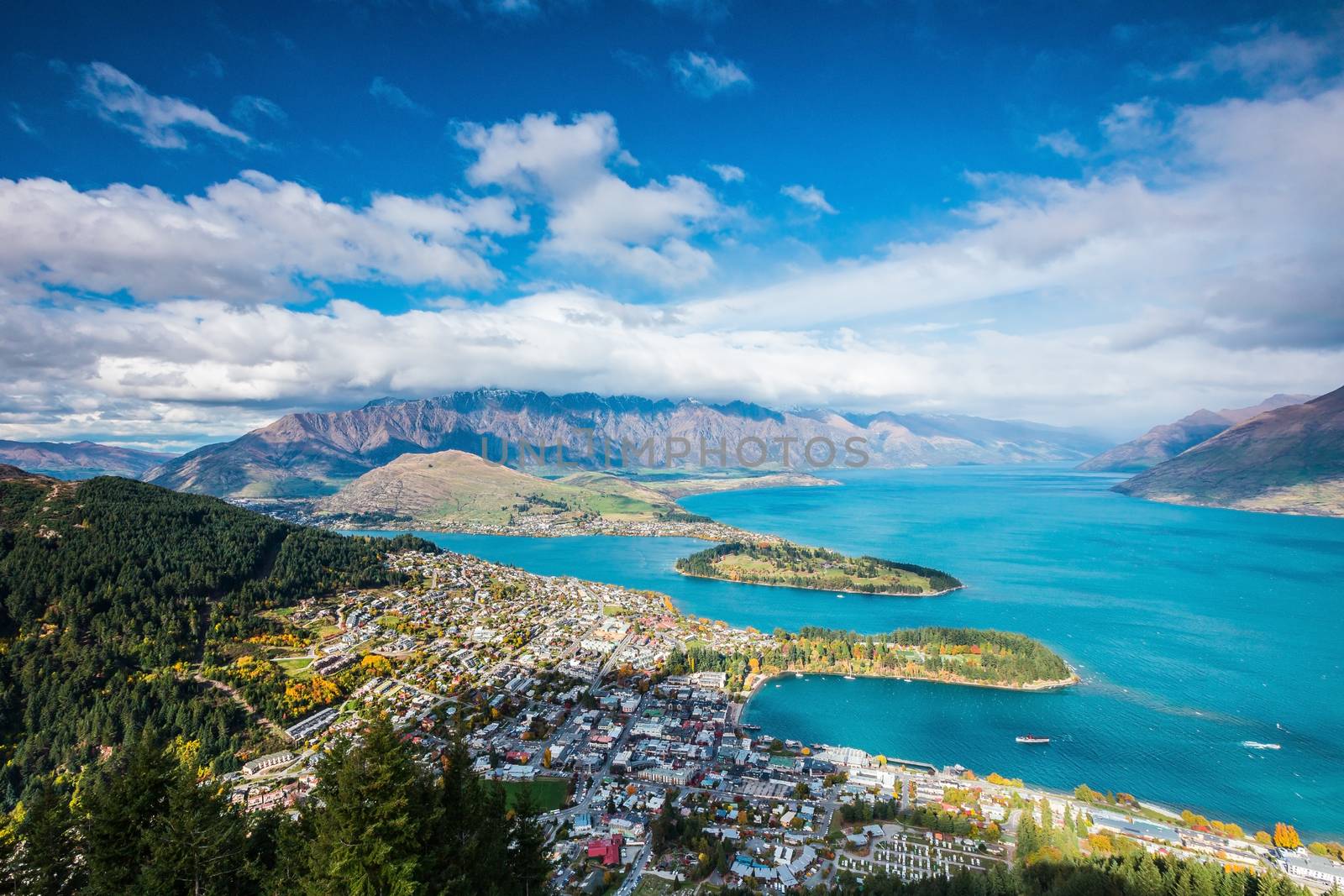 Aerial view of Queenstown in South Island, New Zealand by cozyta