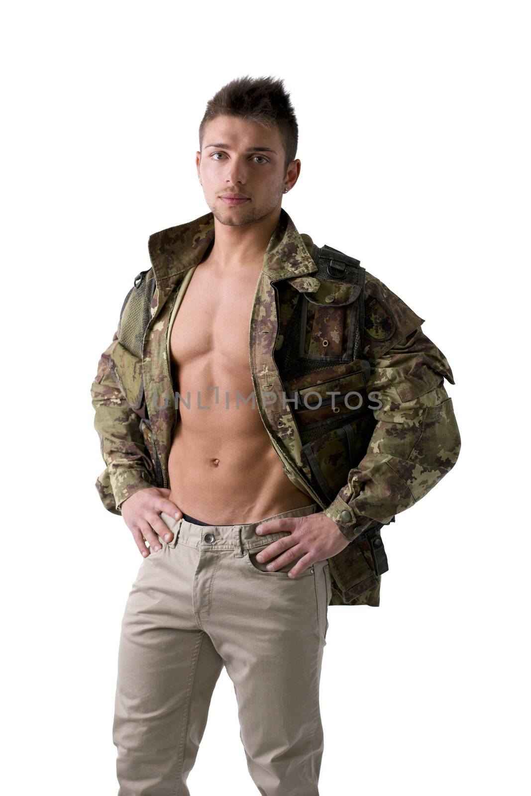 Muscular young man with military jacket on naked torso, isolated on white