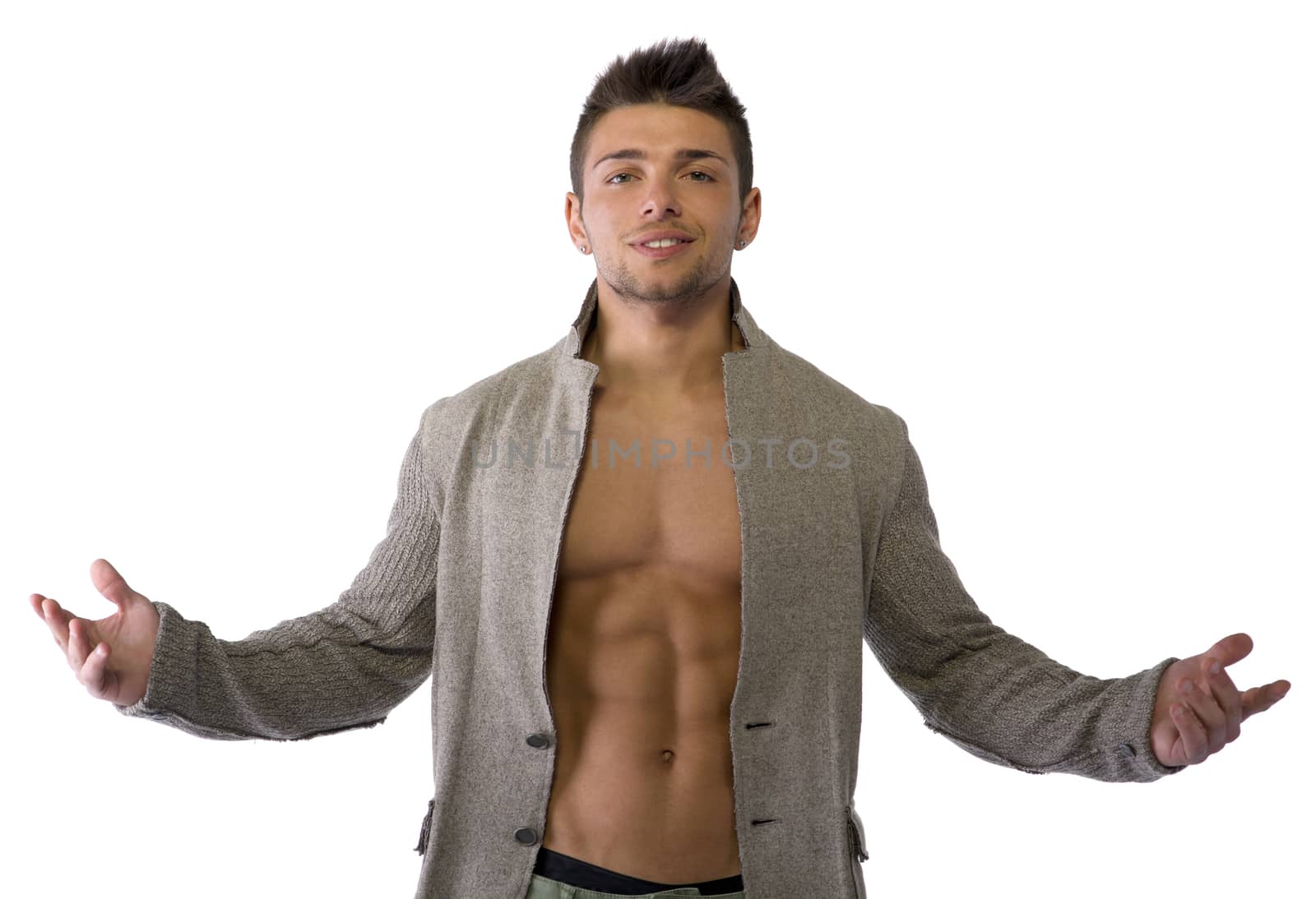 Confident, attractive young man with open jacket on muscular torso, ripped abs and pecs. Side view