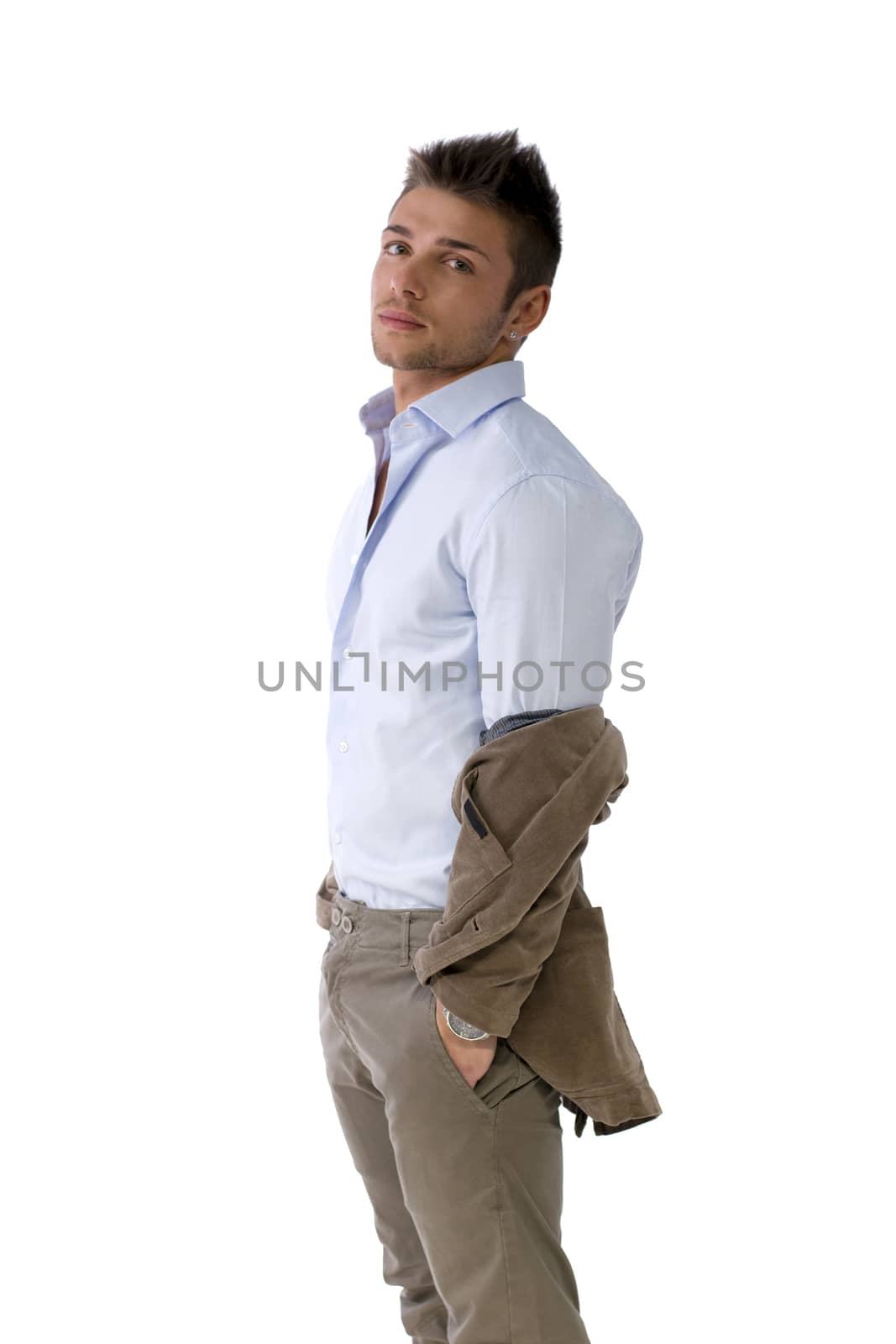 Handsome young man portrait, standing isolated on white, profile position