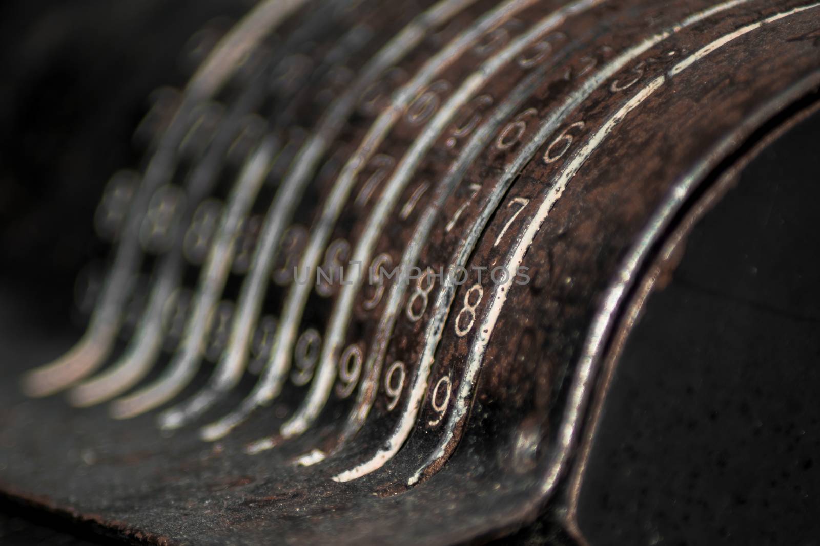 An old vintage cash register with lots of numbers by arvidnorberg