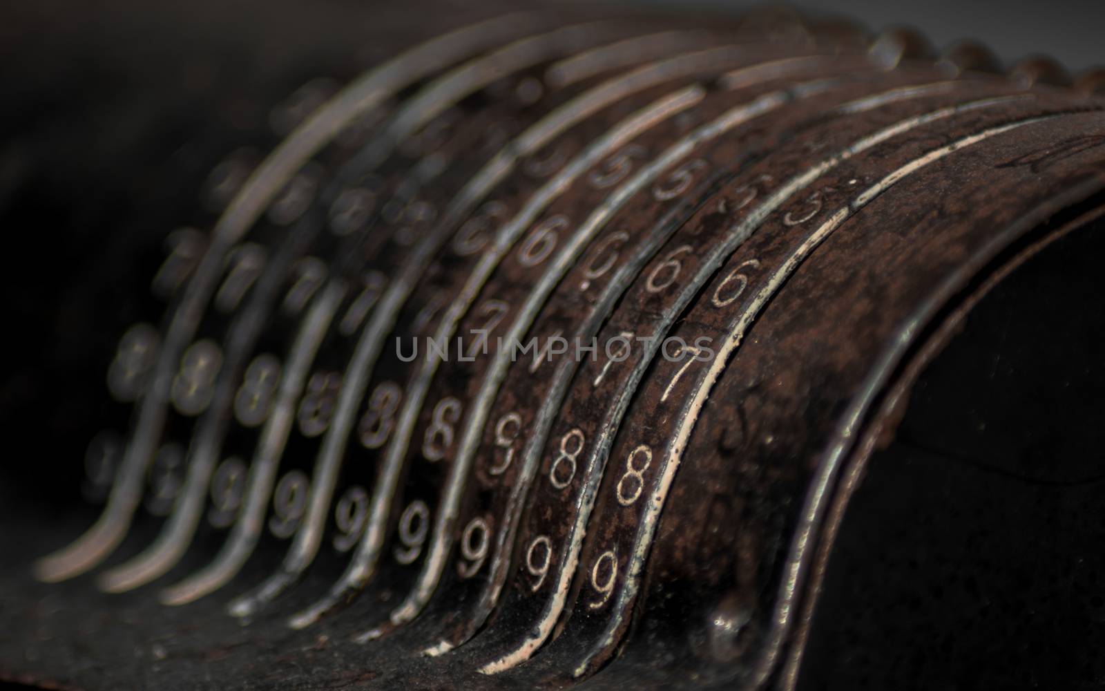 Closeup of an old vintage cash register with lots of numbers