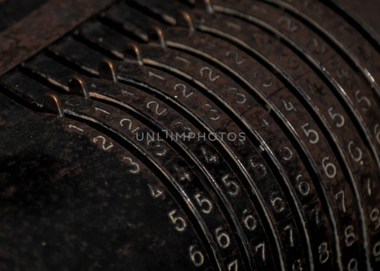 An old vintage cash register with lots of numbers by arvidnorberg