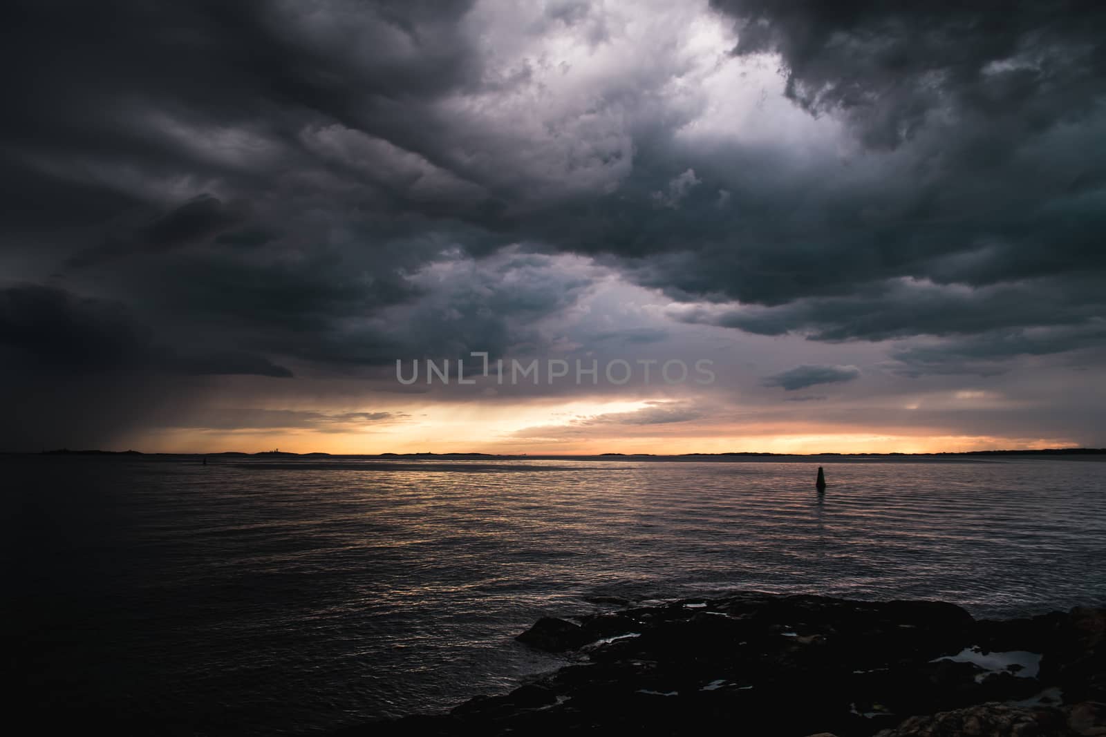 Stormy clouds by the ocean by arvidnorberg