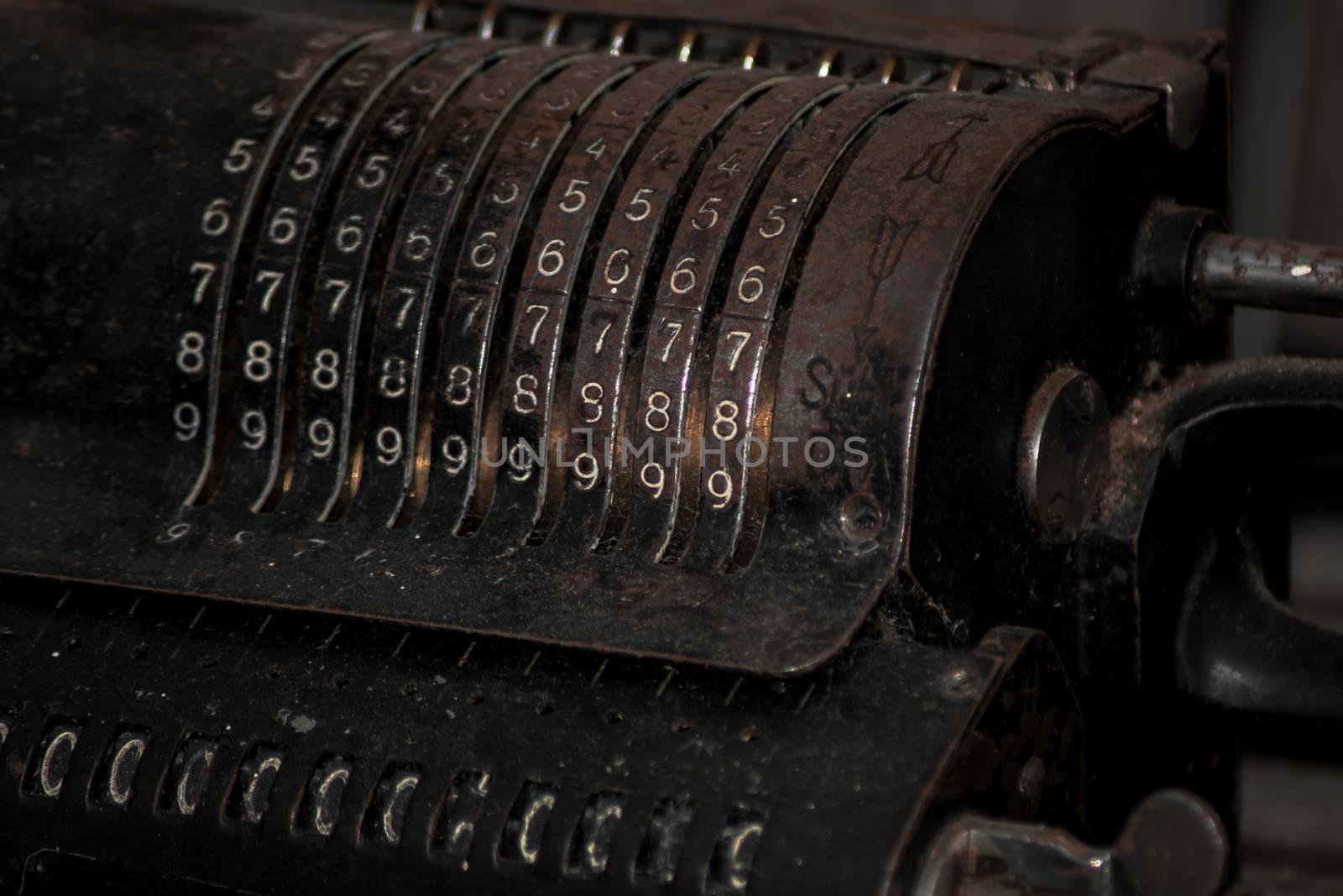 Closeup of an old vintage cash register with lots of numbers